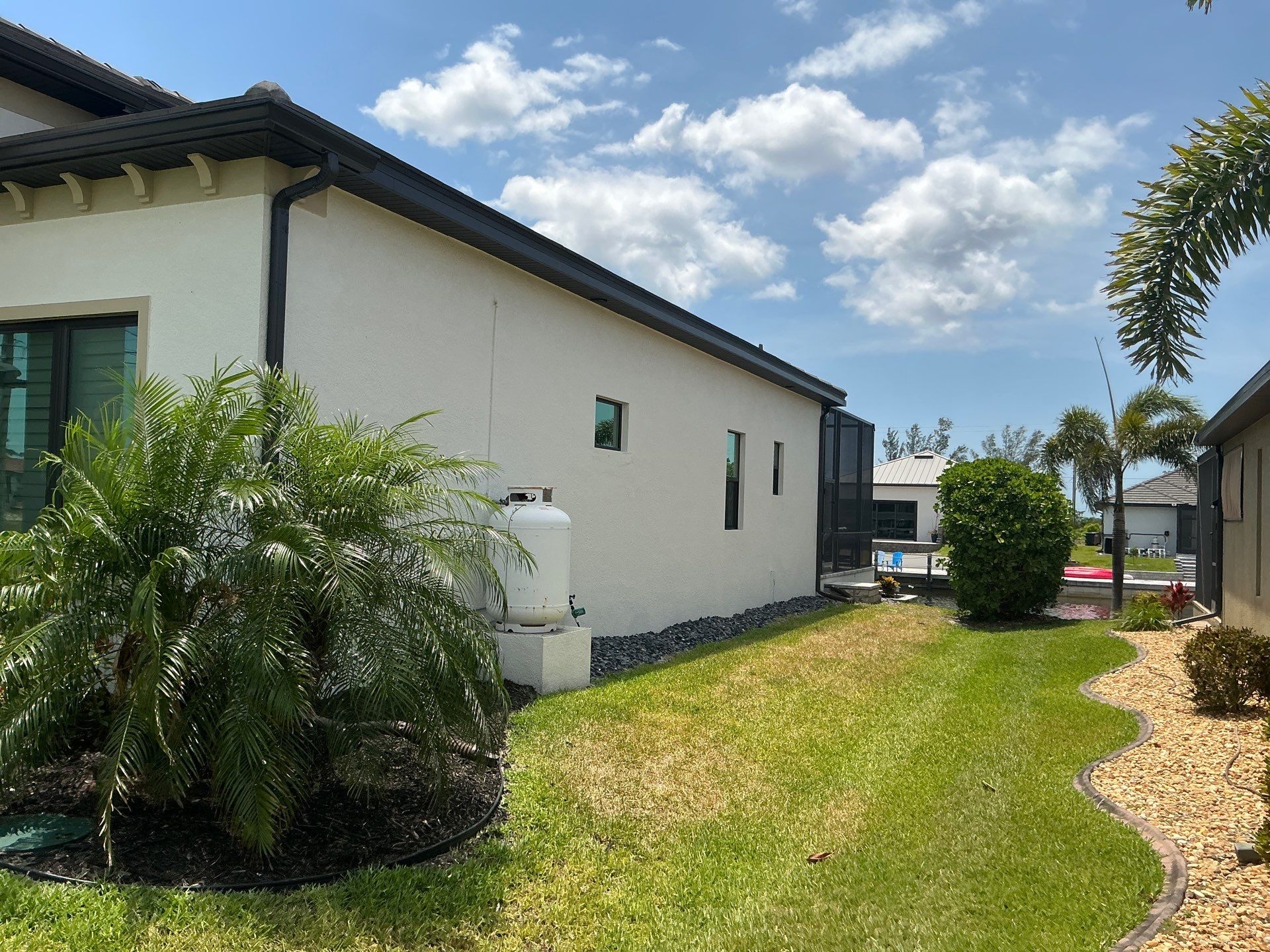 Dark Bronze 7-Inch Gutter Installation in Cape Coral FL by Gutter Professors