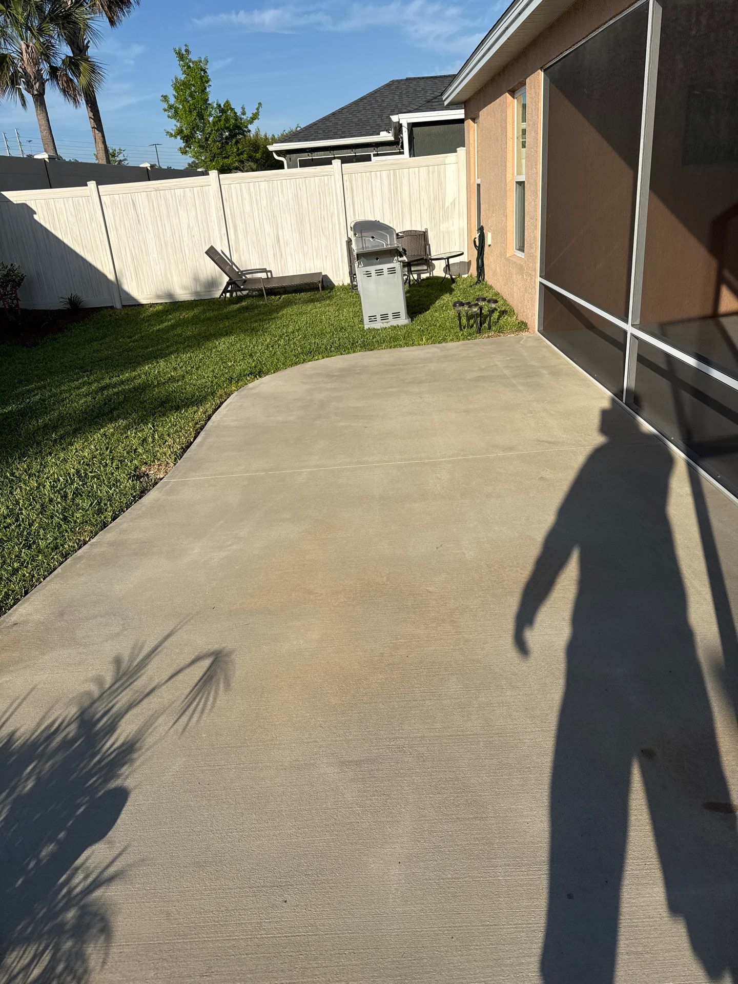 Garage and Lanai With Exterior Pad in Sandstone  by Innovative Concrete Coatings 