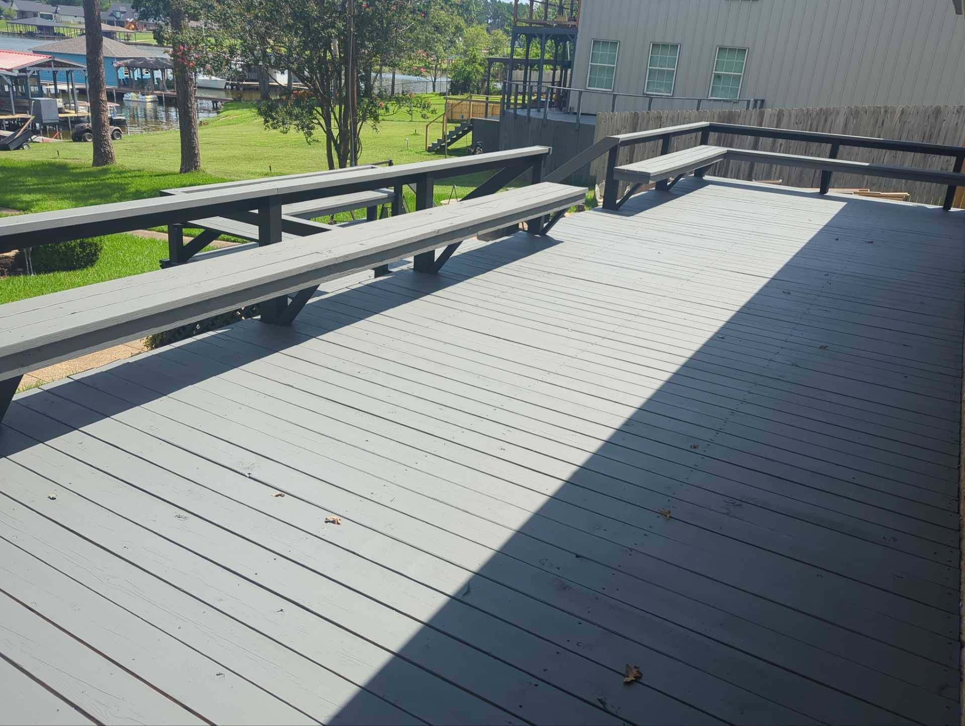 Lake House Deck Restaining in Flint, Texas by Quality Coats Painting