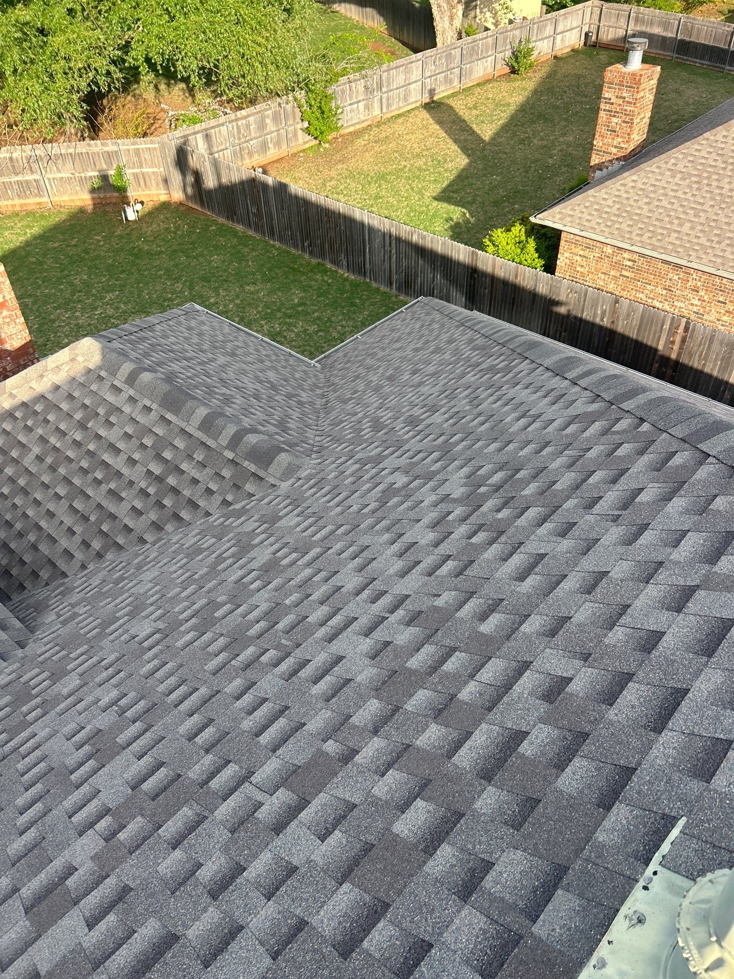 wind turbine replacement in Edmond by McCann's Roofing and Construction