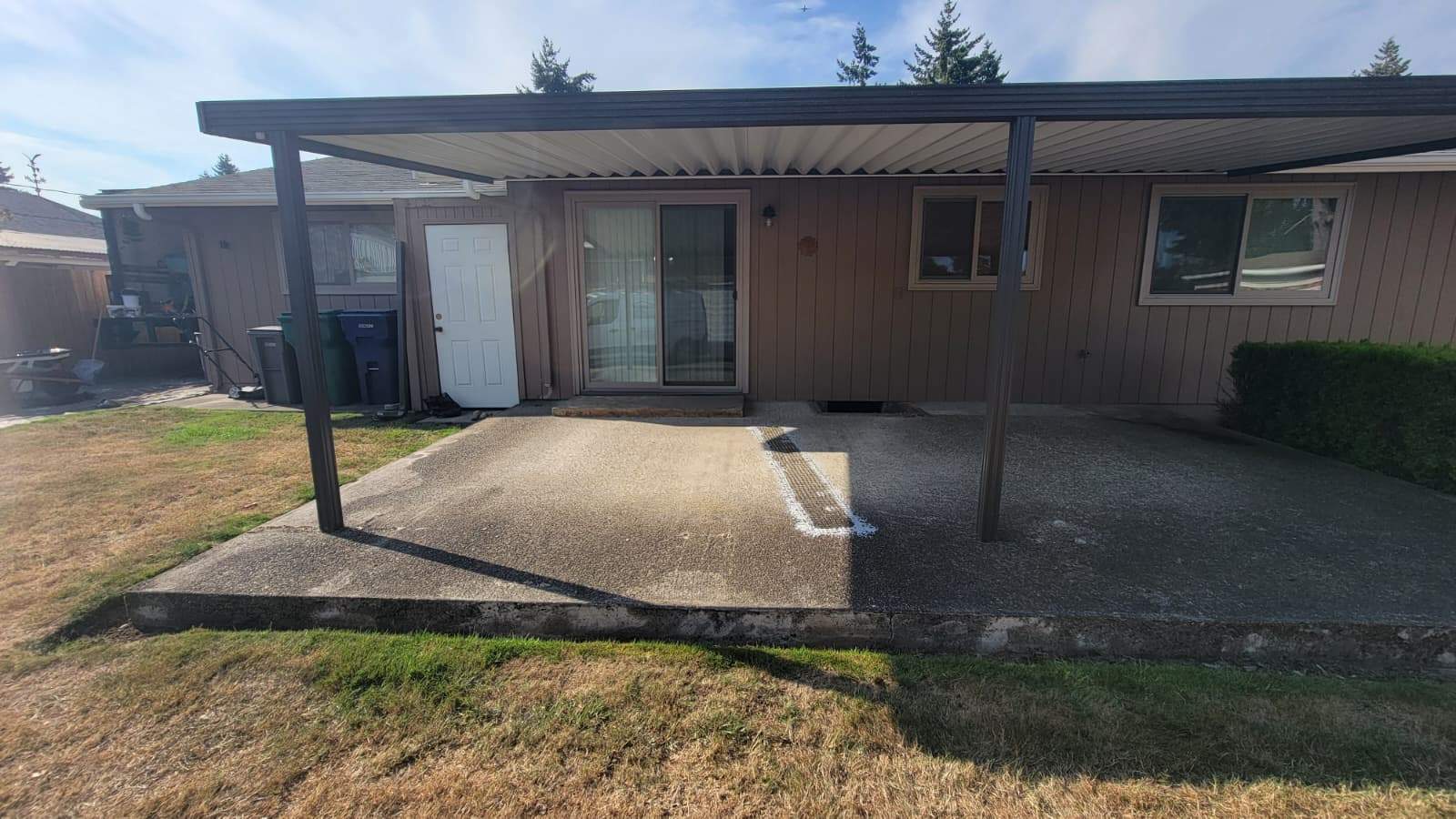Coastal Elegance Patio in PoseidonVuba Stone by Concrete Coating Experts Inc.