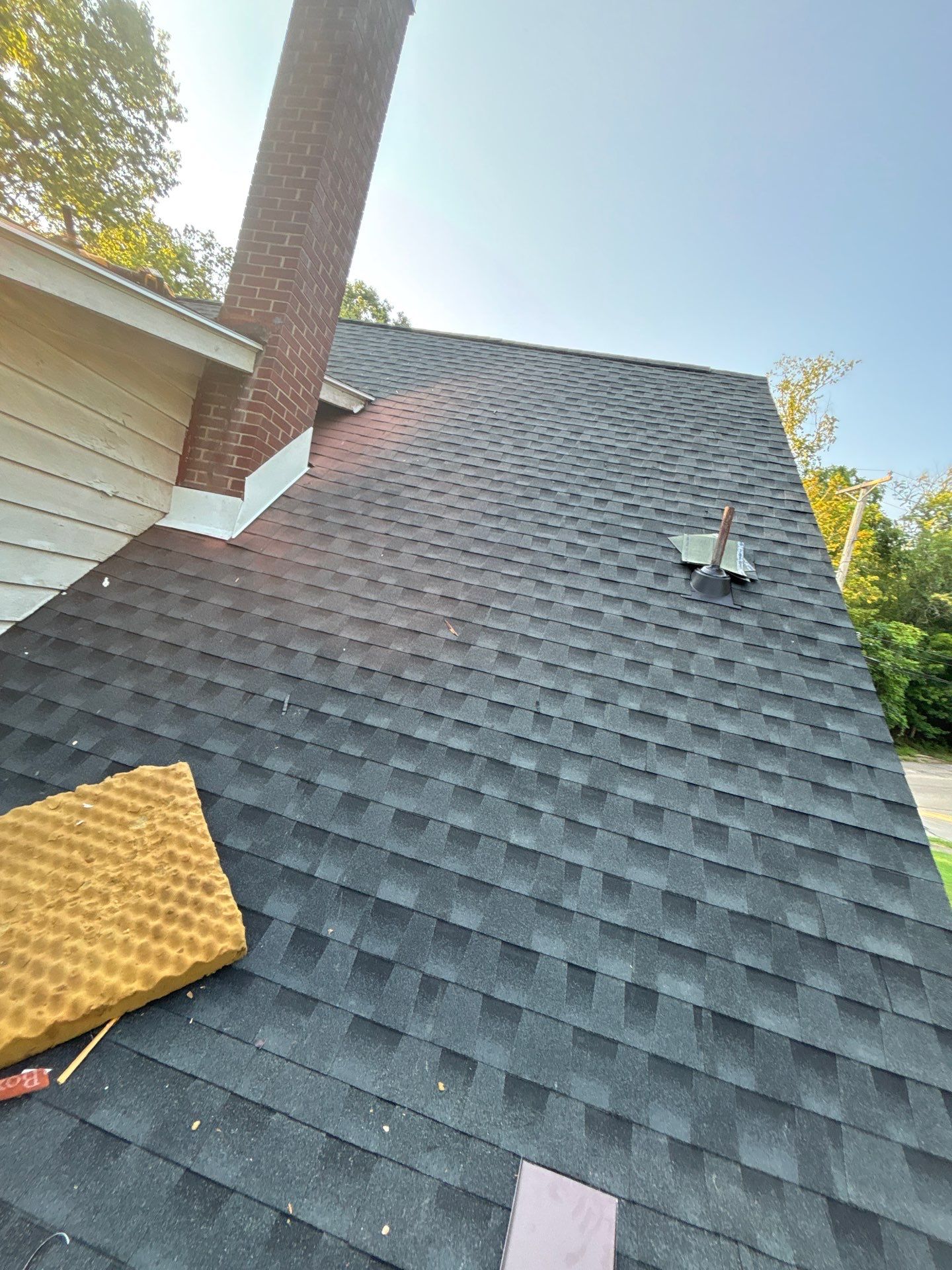 Residential Roofing Installation using GAF Timberline HDZ Charcoal by Rainstoppers Roofing