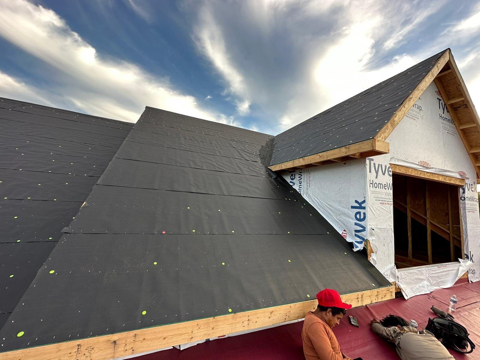 Residential Roofing Installation using Tamko Heritage AR with Standing Seam Metal Porch by Undersun Roofing 