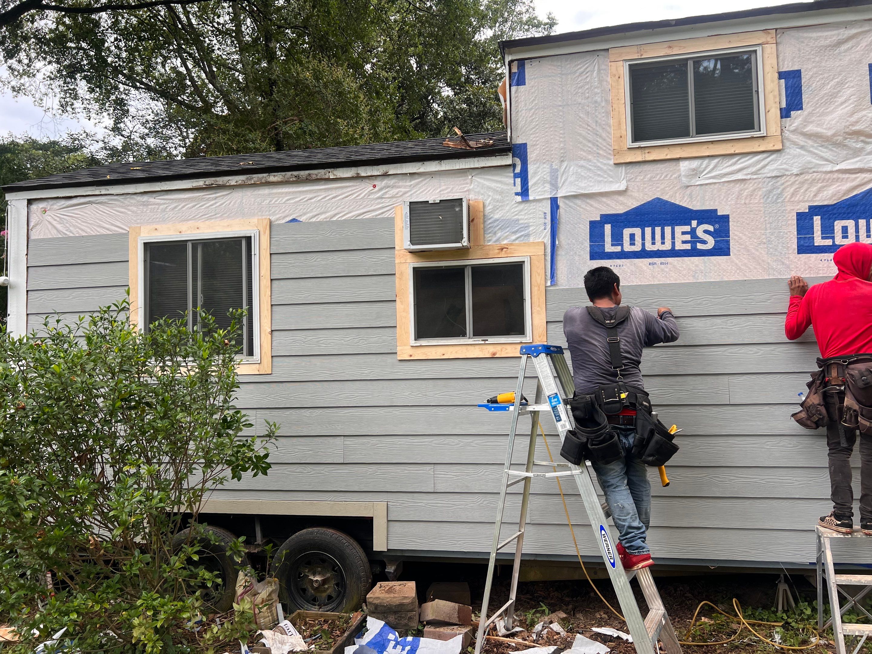 tiny home remodel- siding,paint,roofing by Nailed It Roofing & Remodeling LLC