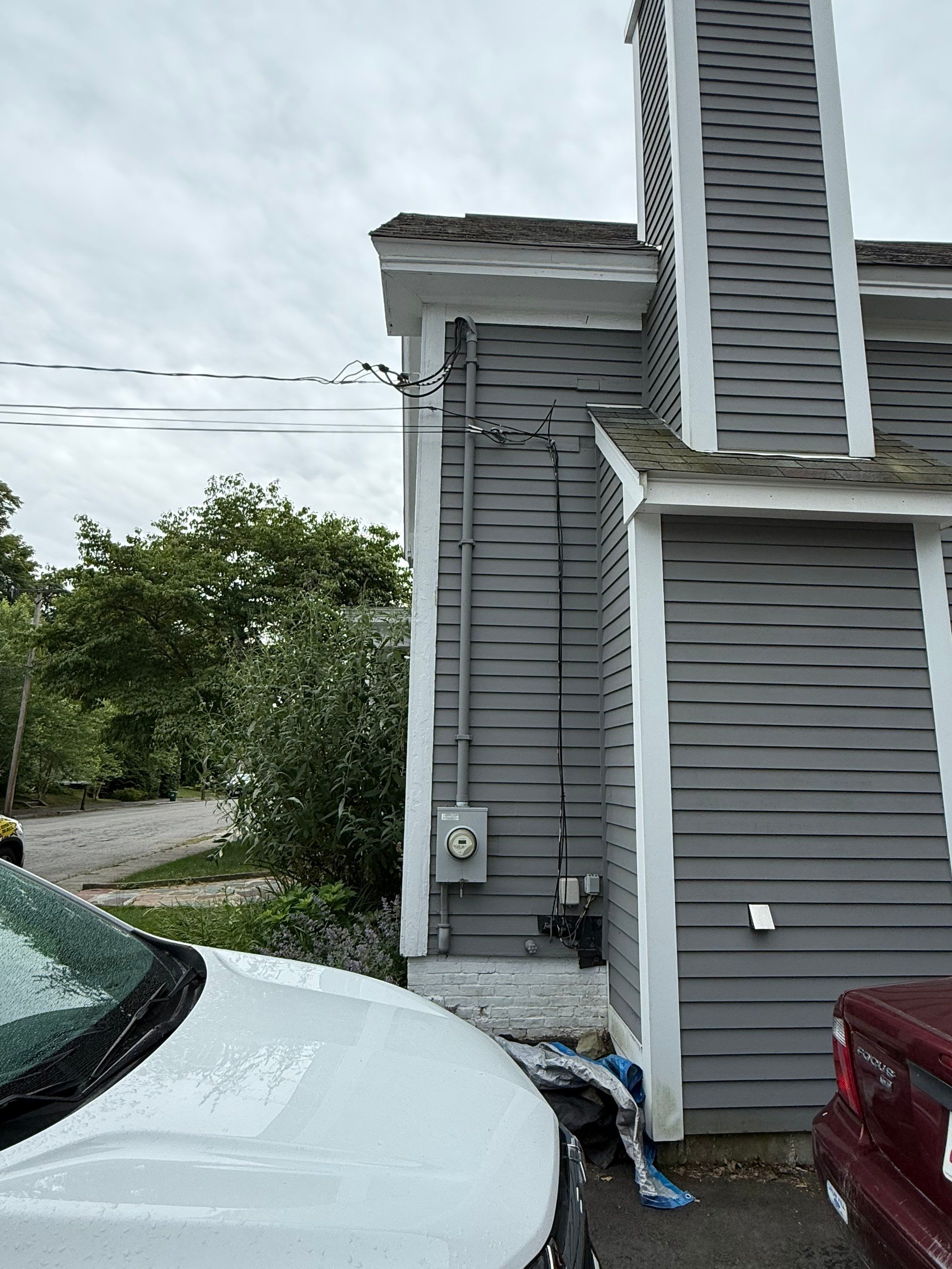 Full Roof Replacement + Custom Gutter Install | Onyx Black Finish by Mighty Dog Roofing of Greater Middlesex County