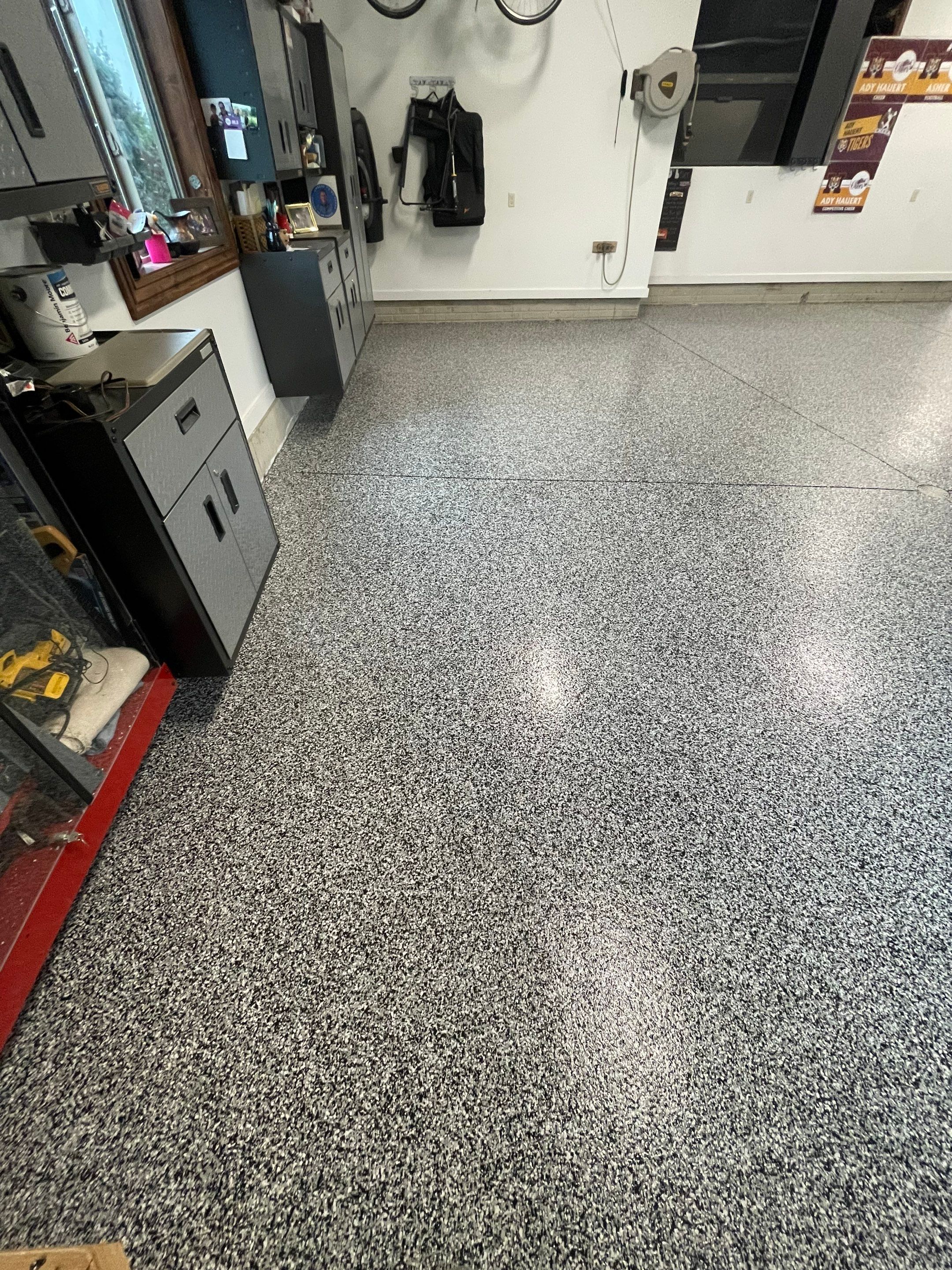Garage Floor Coating and Domino Flake Finish in Sioux Falls by Select Painting, Coatings & Garage Cabinets