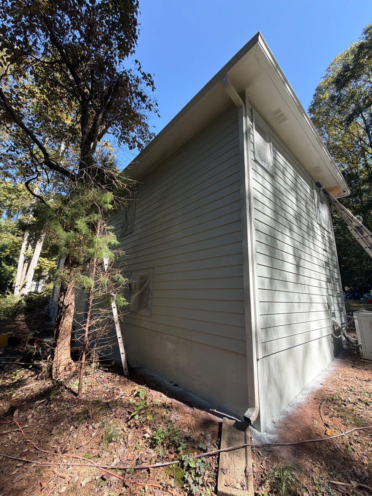 Exterior Residential Painting and Deck Refinishing in Canton, Georgia by Swift Home Renovations 