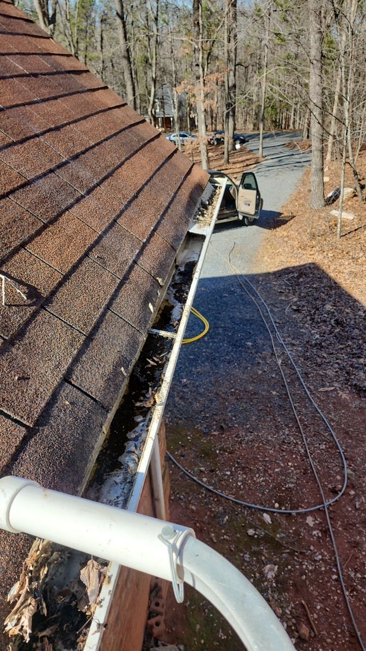 Gutter and Roof cleaning using cleaner by G&H Home Tech Pros LLC