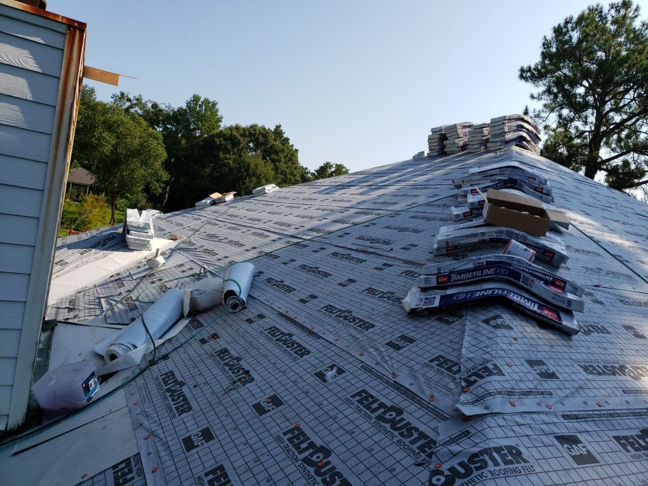 Residential Roofing Installation using Roof Replacement by American Roofing & Construction LLC