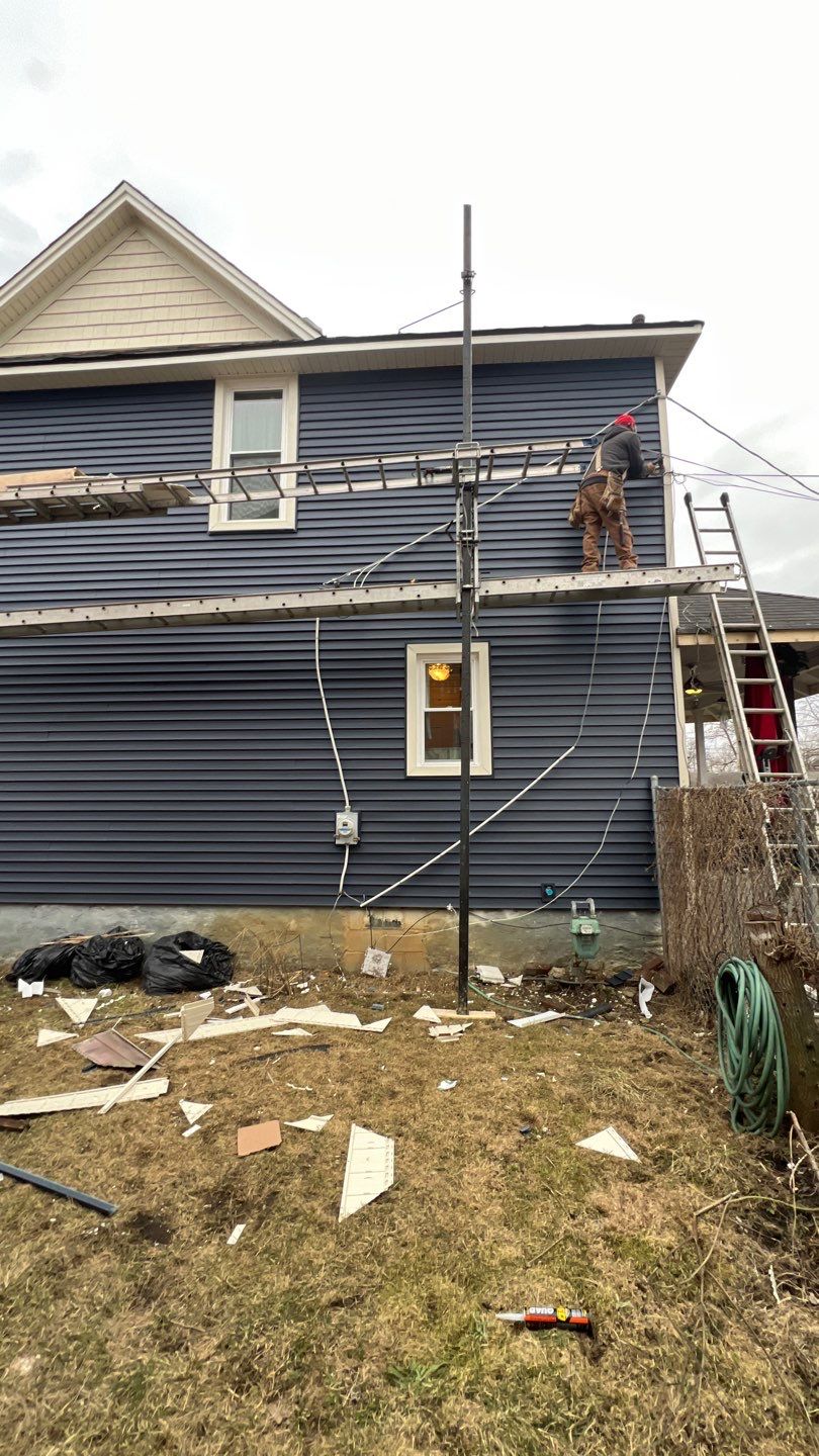 Adding Windows and installing Siding by Know-A-Guy Roofing & Exteriors