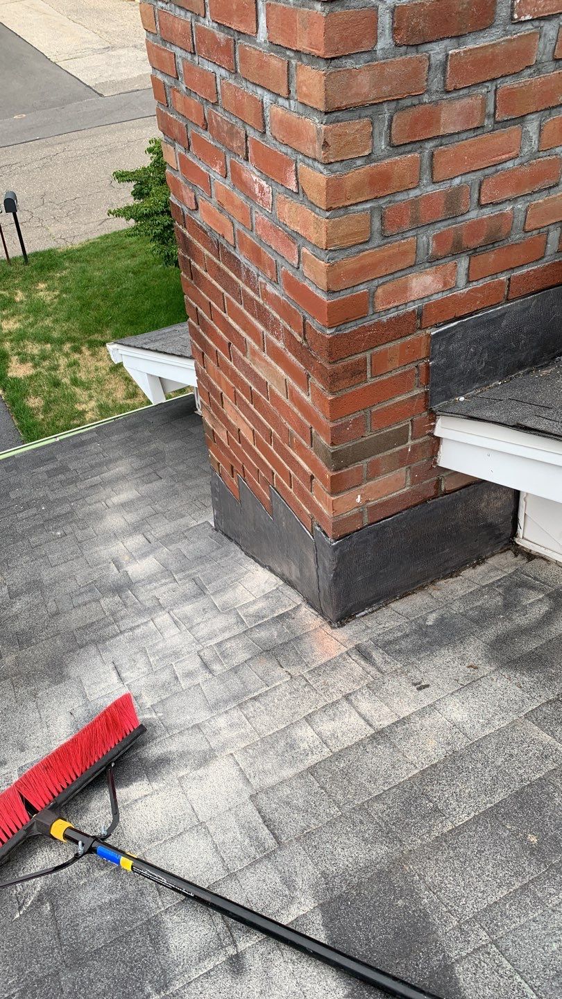 Residential Roofing Repair using Chimney Flashing by A Plus Exterior