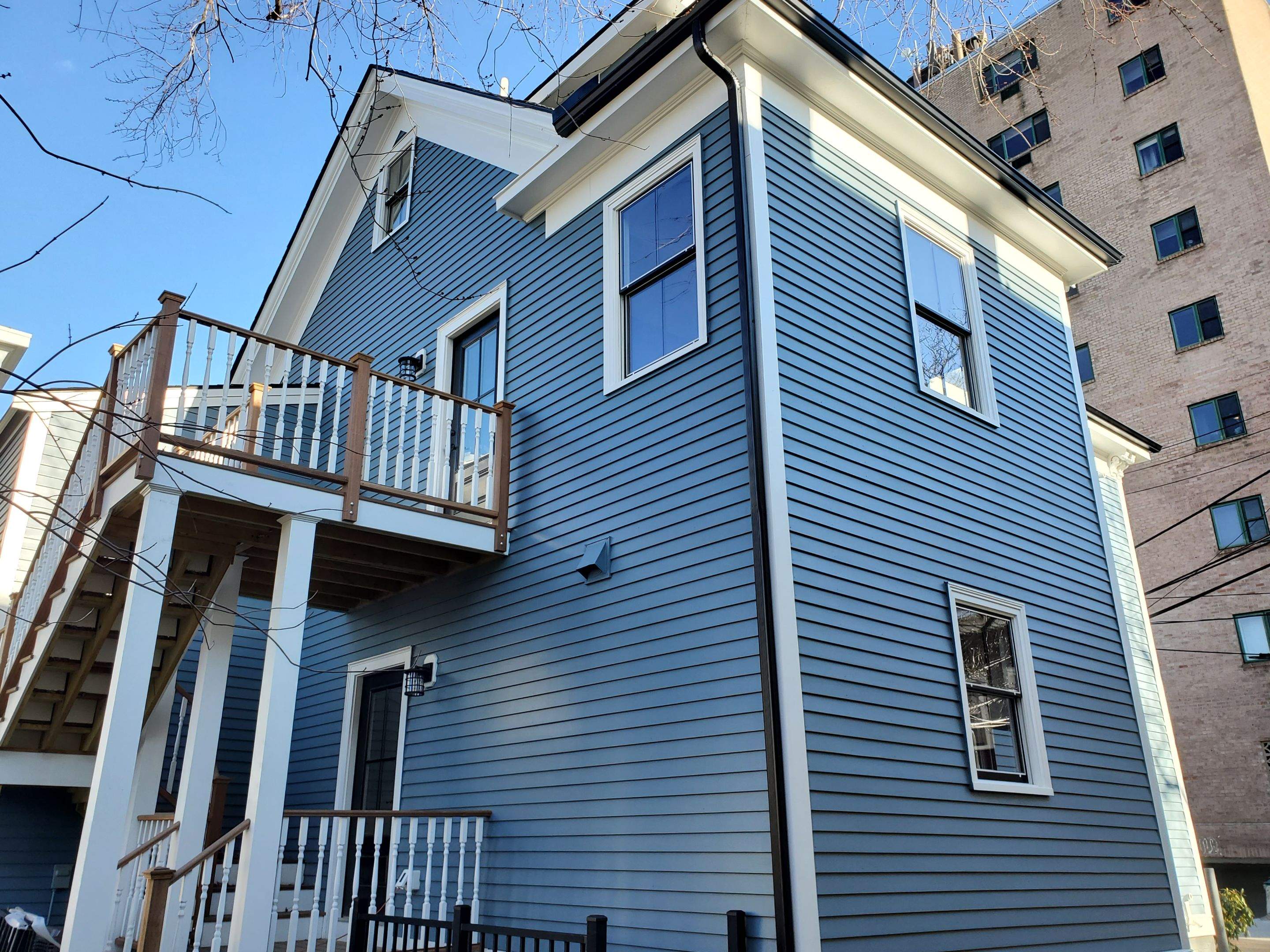 Siding Installation using Wood Clapboards by UBrothers Construction