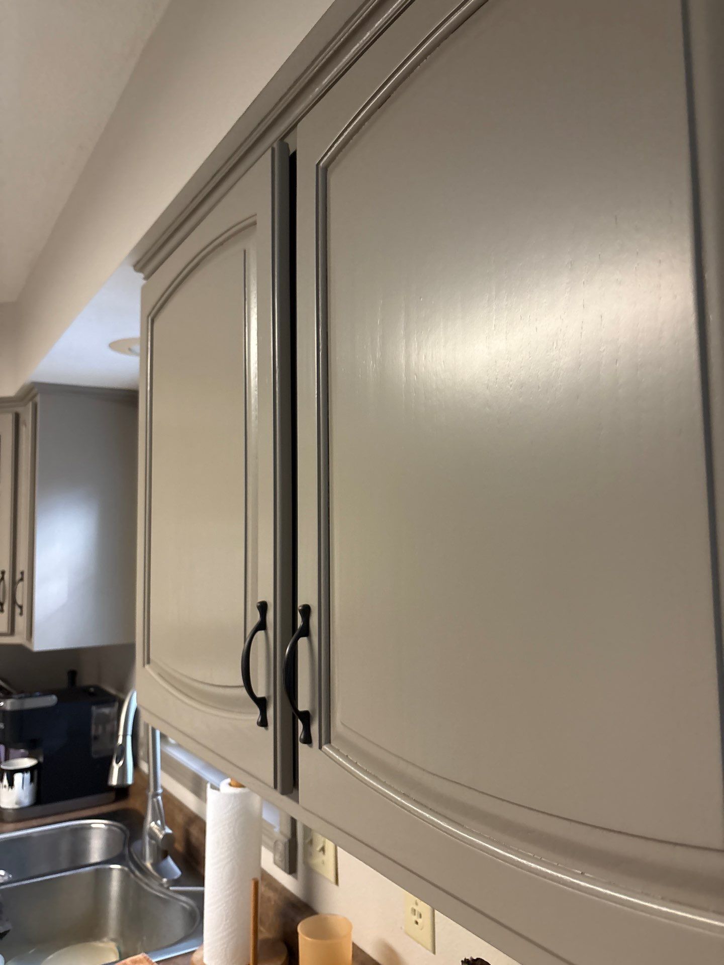 Kitchen Cabinet Painting and Hardware Update in Sioux Falls by Select Painting, Coatings & Garage Cabinets