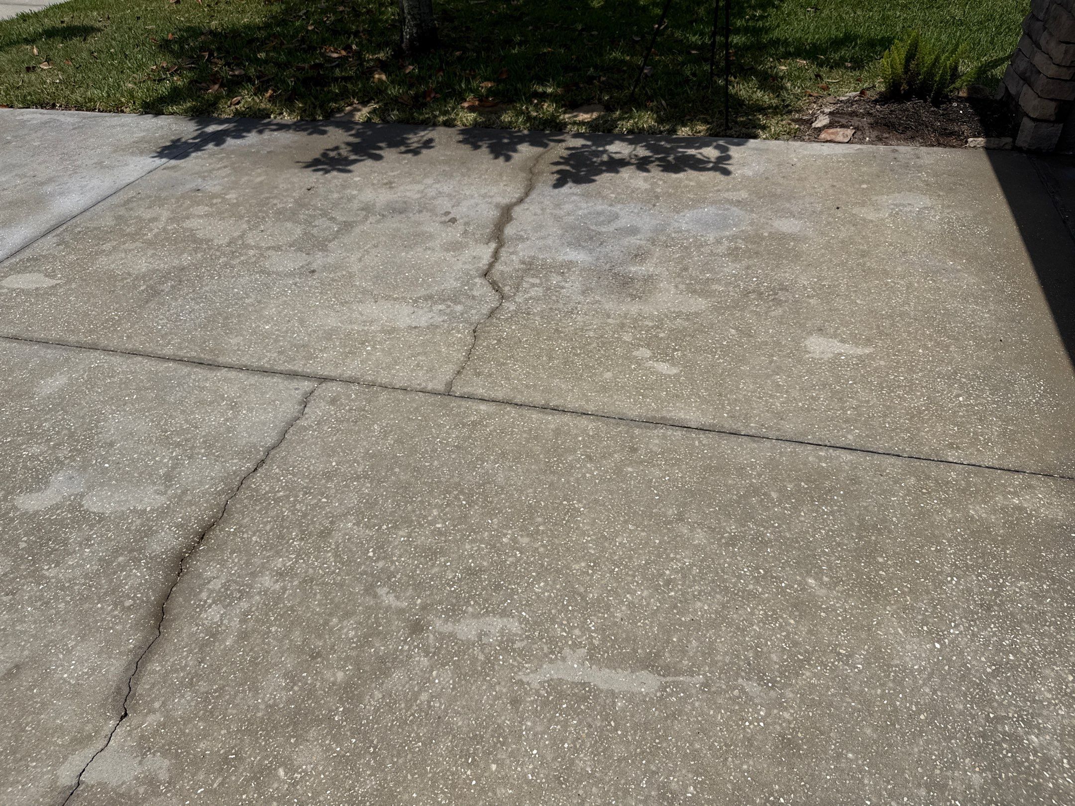 Concrete Driveway Oil Stain Removal | Harrison Ranch Community | Parrish, FL by Sunshine AquaWash