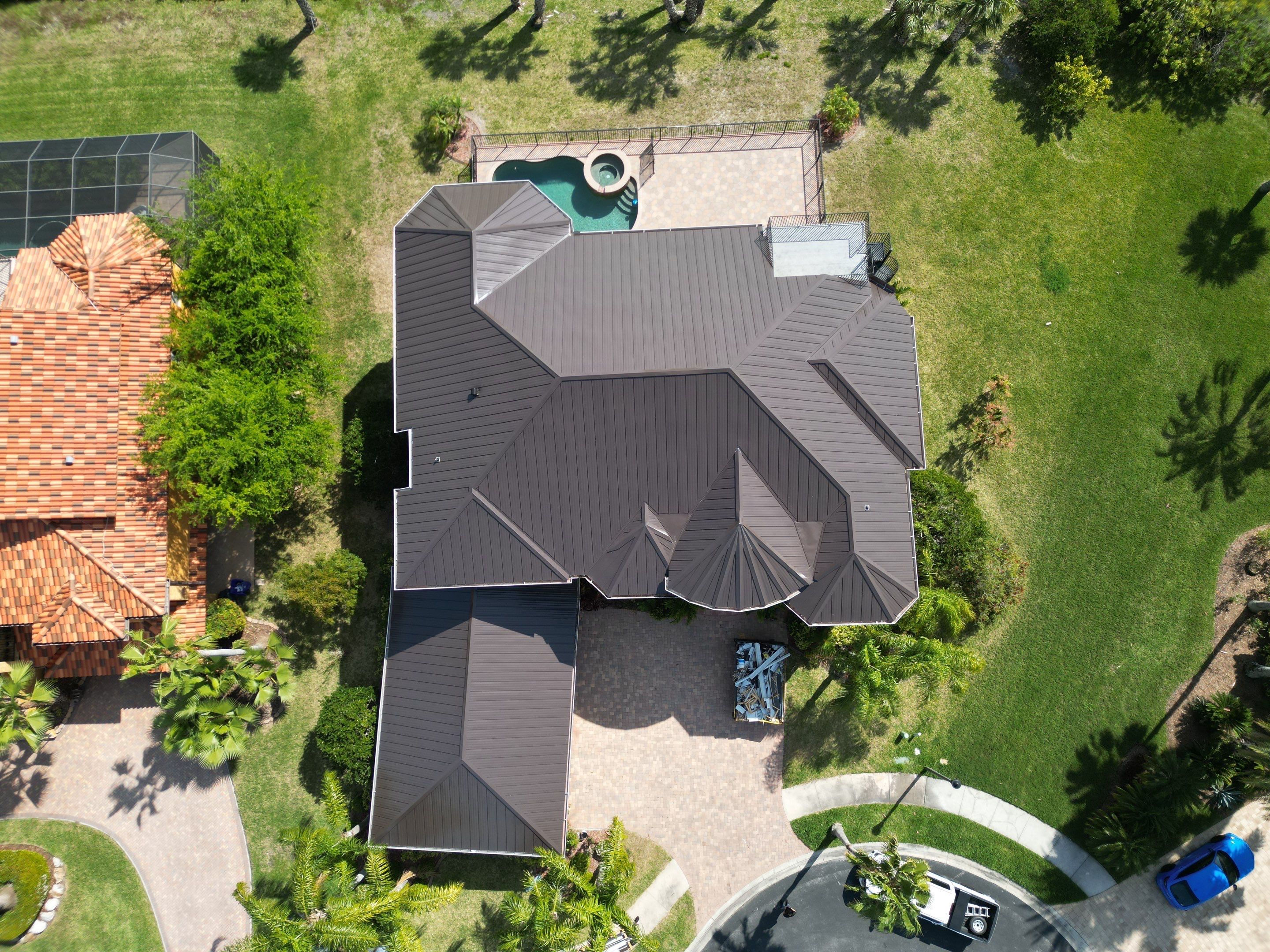 Dark Bronze Standing Seam by Reimagine Roofing