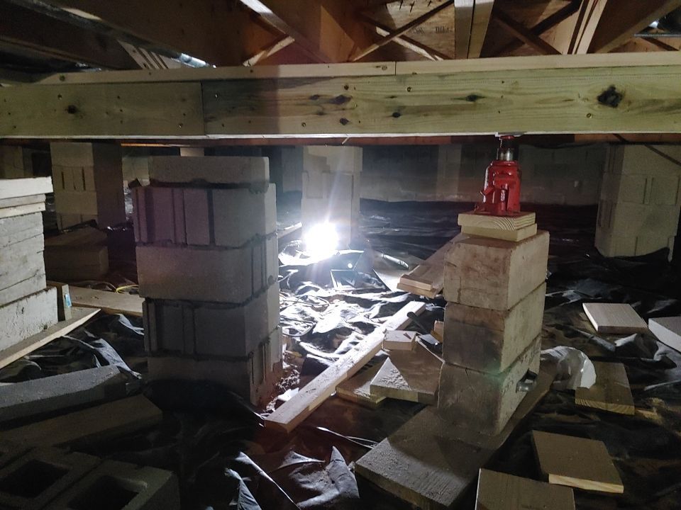 Crawl space encapsulation and Waterproofing using Structural Wood and Steel Reinforcements by Toledo Basement Repair 