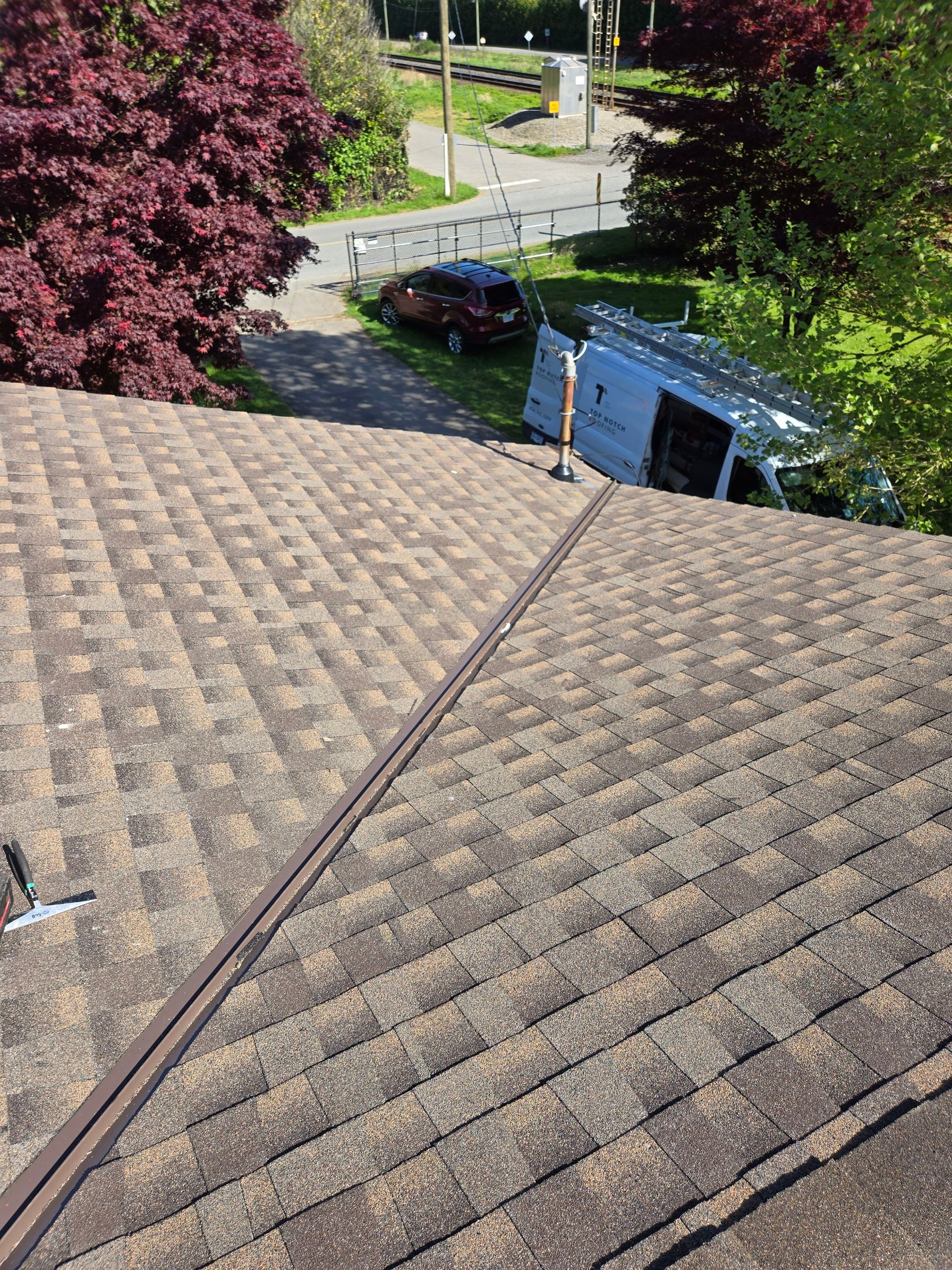 Shingle Re-Roof by Top Notch Roofing Inc