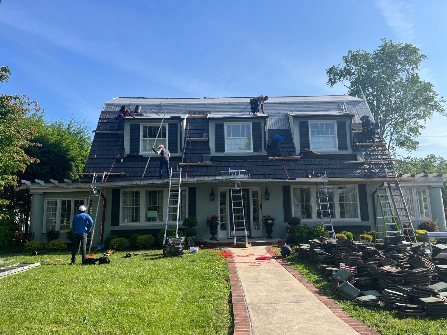 Slate removal/Cedar Shake replacement by Storm Contracting 