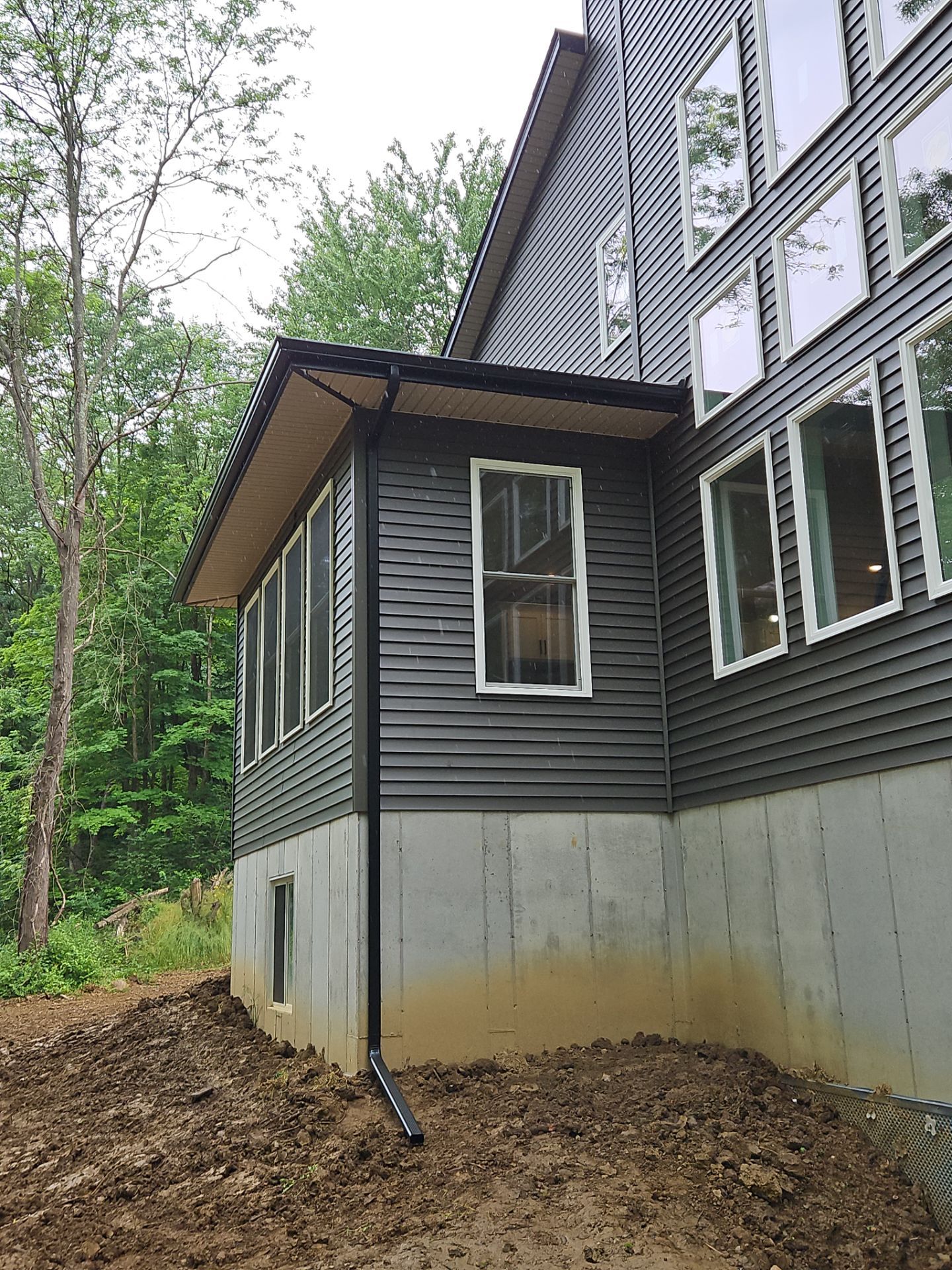 Gutter Installation using 5" Seamless Gutters and Downspouts by RoofX 