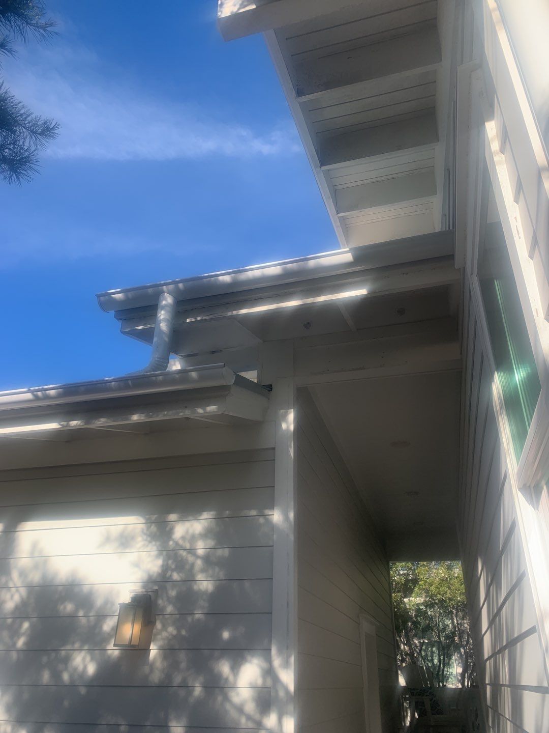 White Half-Round Gutters Installation in Rosemary Beach, FL by Gutter Professors
