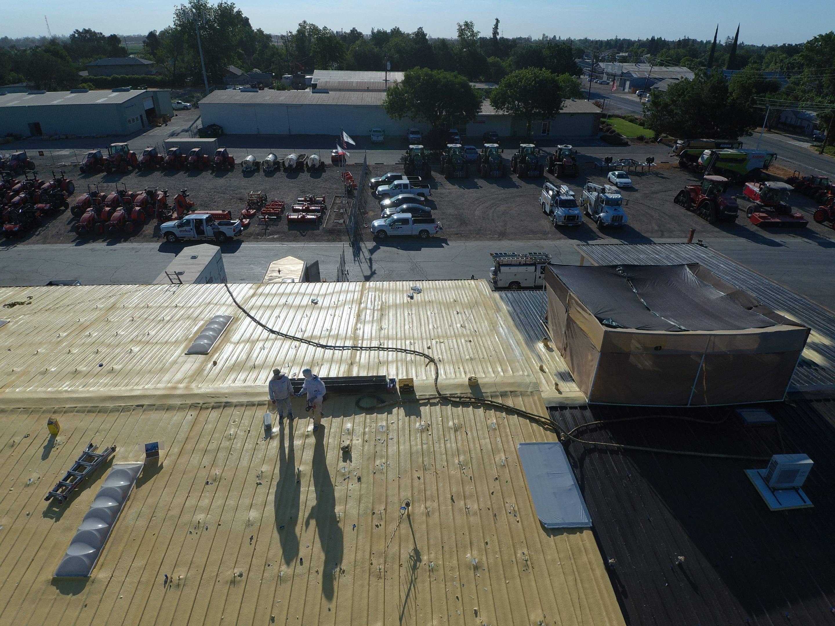 Spray foam and coatings using Conklin Benchmark/PUMA XL coatings and spray foam by Straight Edge Roofing Inc