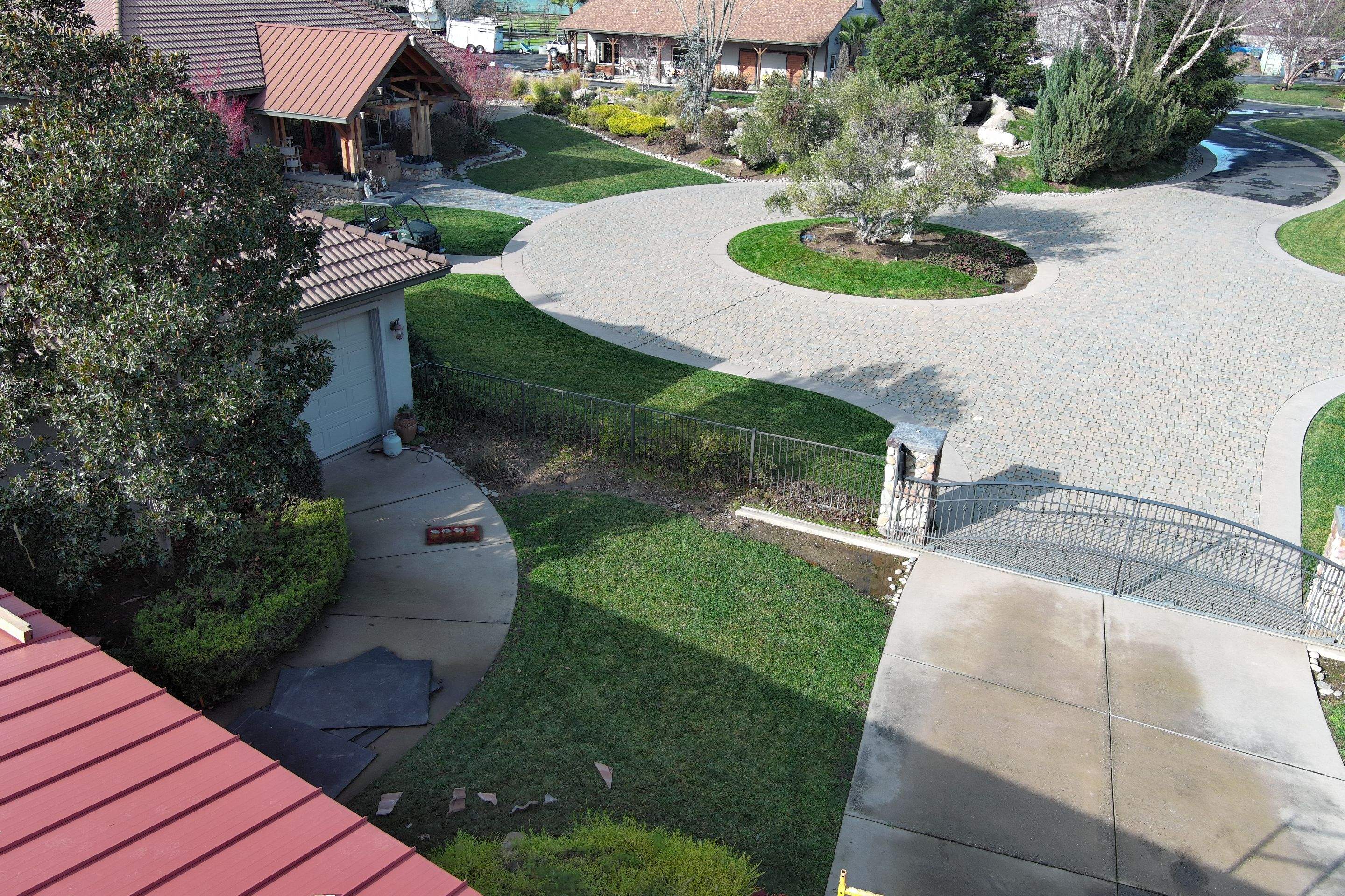 Tile, Metal, and TPO roofing project (new construction) by Straight Edge Roofing Inc