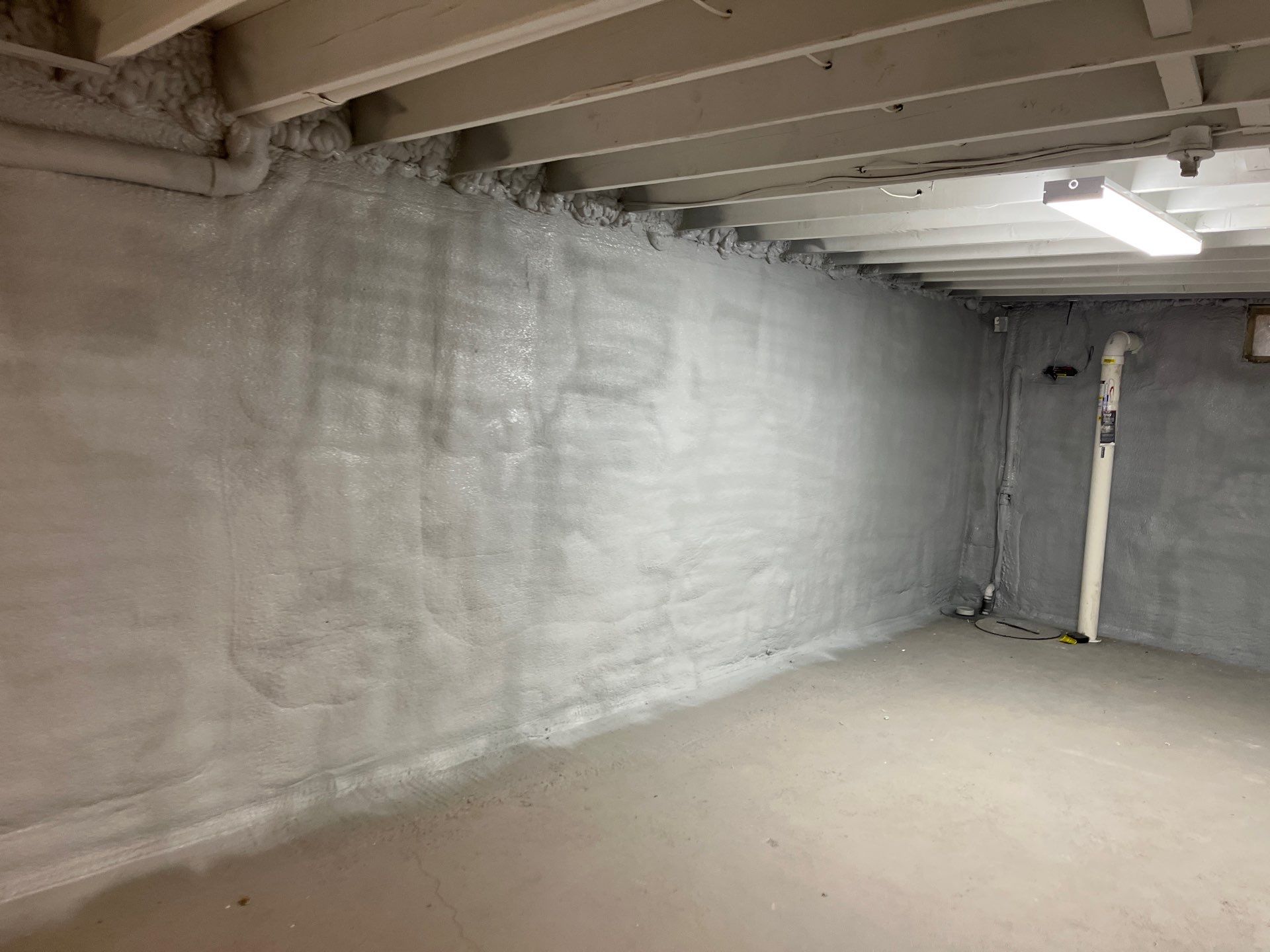 Basement Exterior Walls using Closed Cell Spray Foam by NYS Foam & Energy
