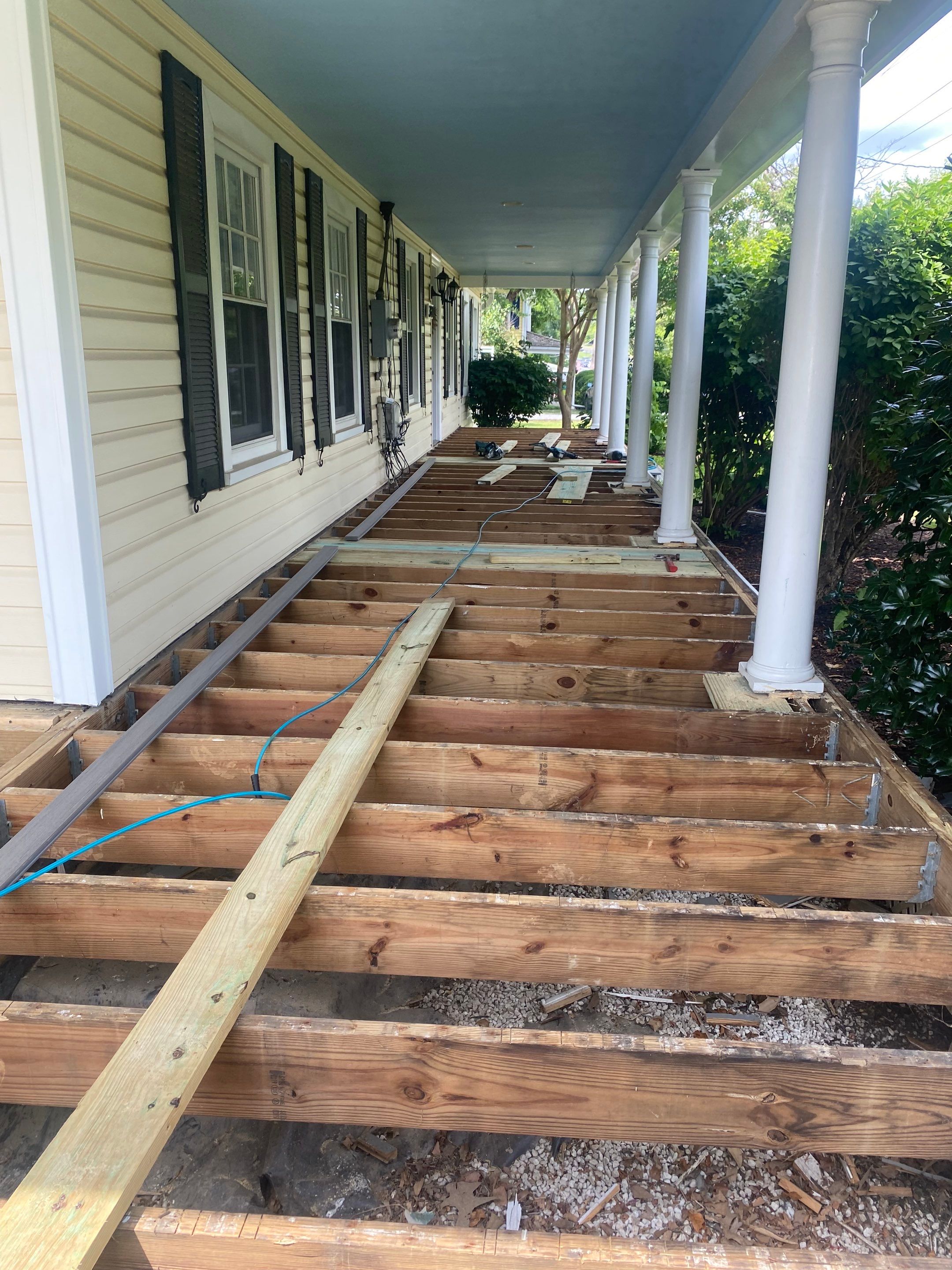 Front Porch Transformation using Timbertech Decking by The Smet Companies, LLC