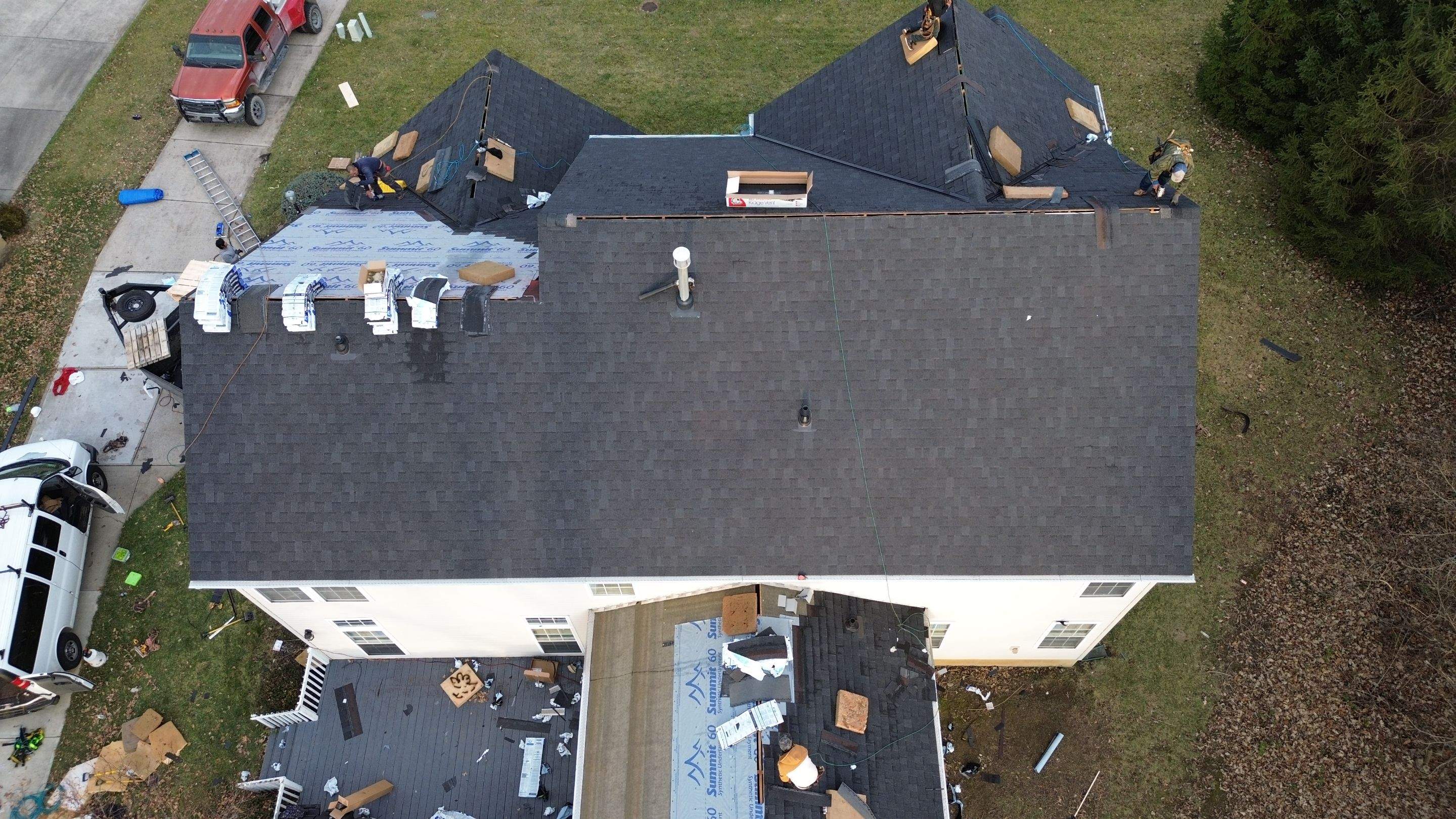 Walden Ponds - Pristine Black and Hydro Flo Gutter Guards by Tamlin Roofing