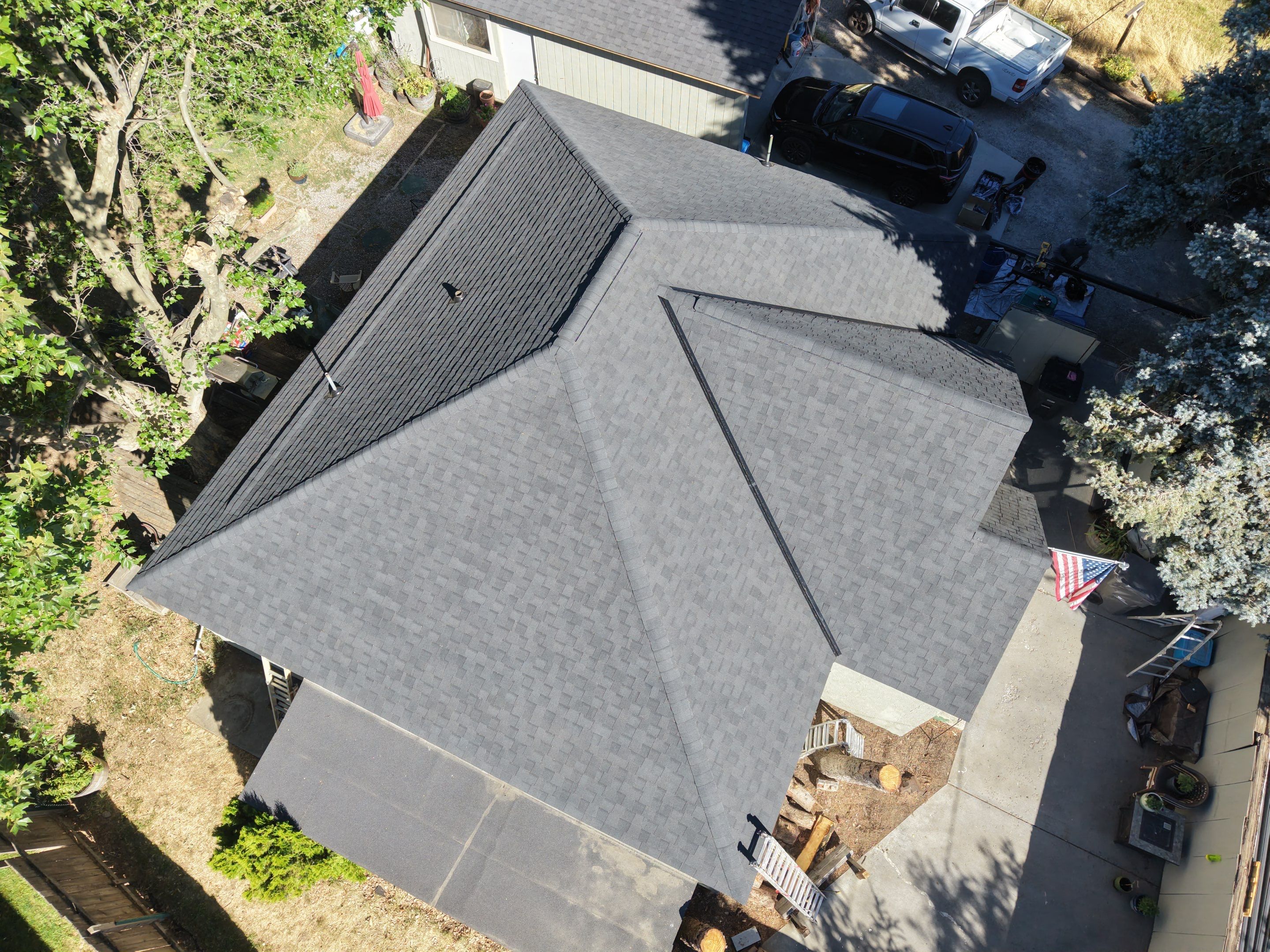Residential Asphalt Shingle Roof Replacement for Home and Garage in Wenatchee by Alpine Roofing