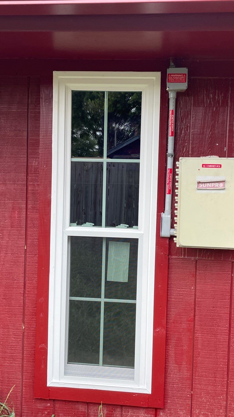 Black and white and red all over by Bayfront Roofing and Construction