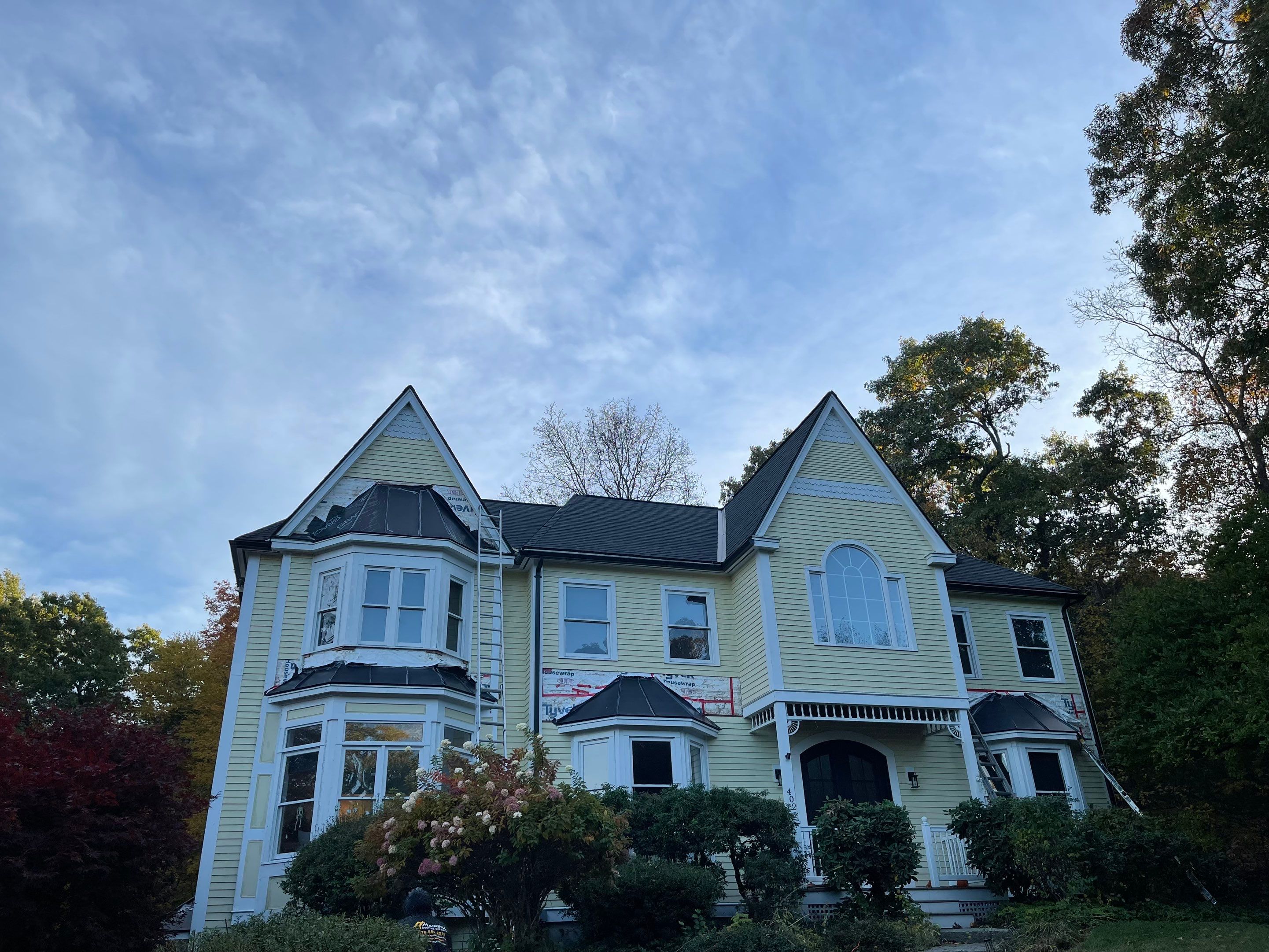 New Roof, Skylights, and Metal Accent Roof Installation in Groton by Mighty Dog Roofing of Greater Middlesex County