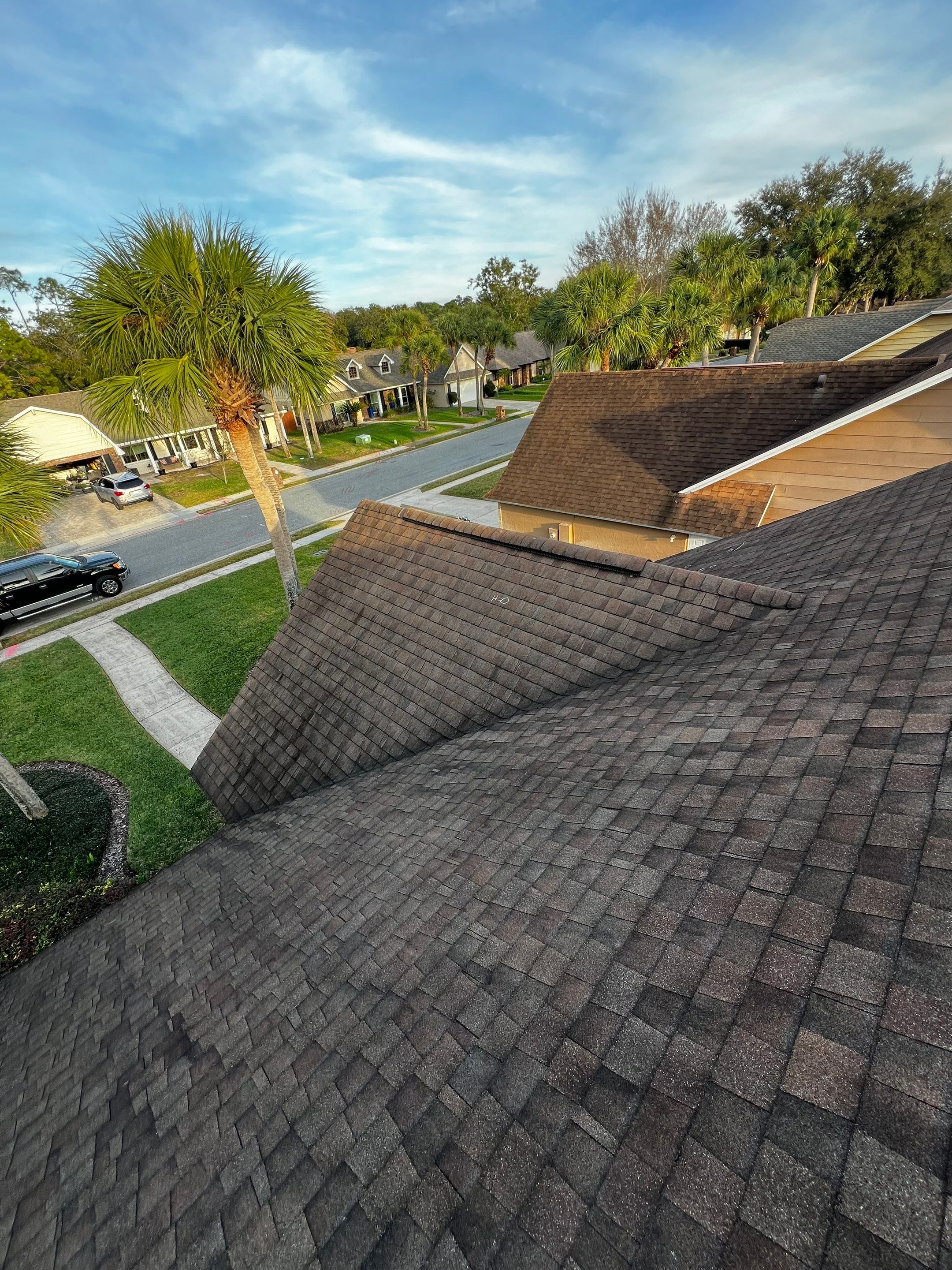 Asphalt Architectural Shingle Roof Replacement and Solar Integration in Longwood by Fortified Roofing Solutions Corp.
