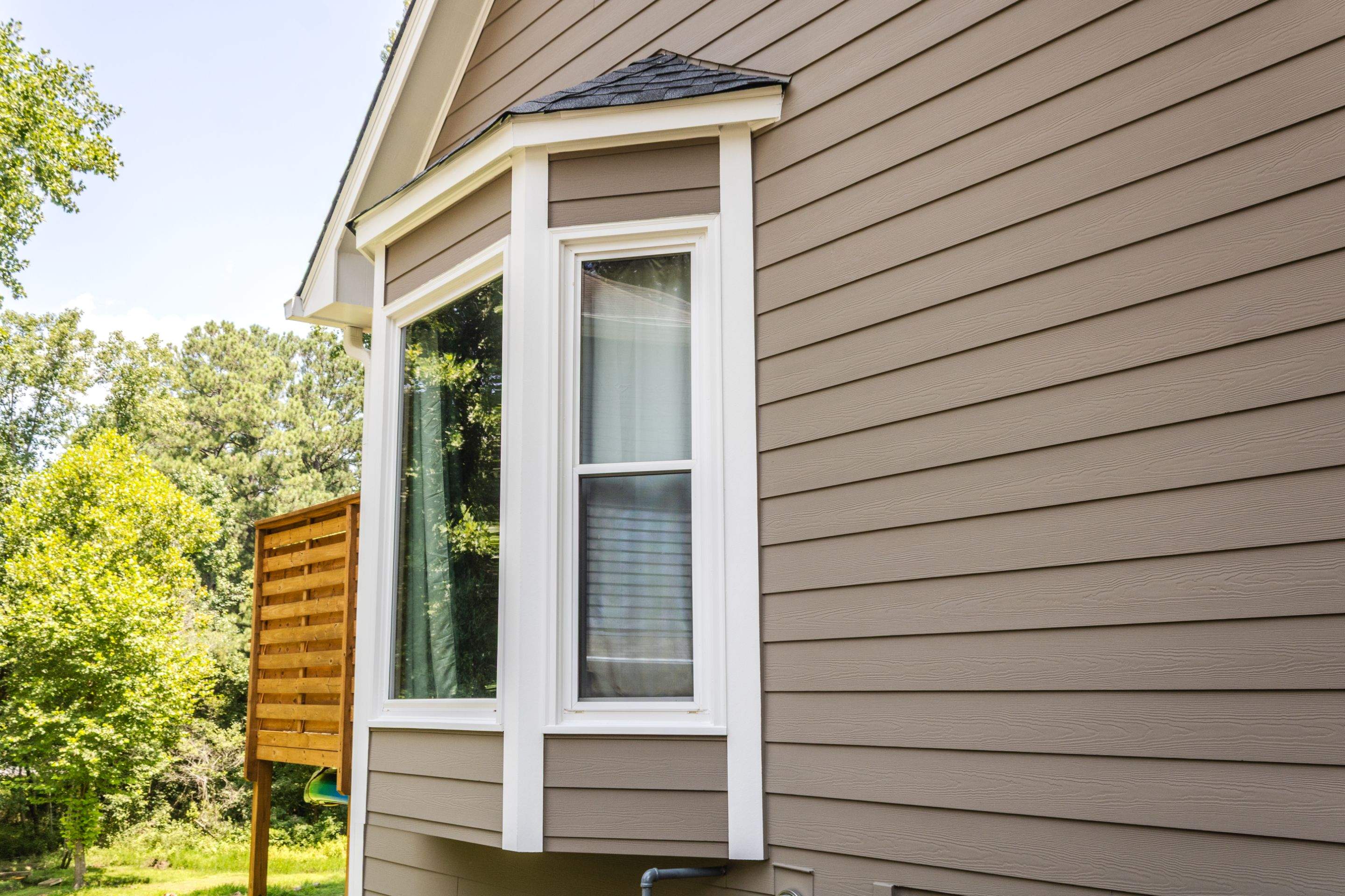 Siding Replacement and Exterior Painting using James Hardie Lap Siding and Sherwin Williams Paint by Nelson Exteriors 
