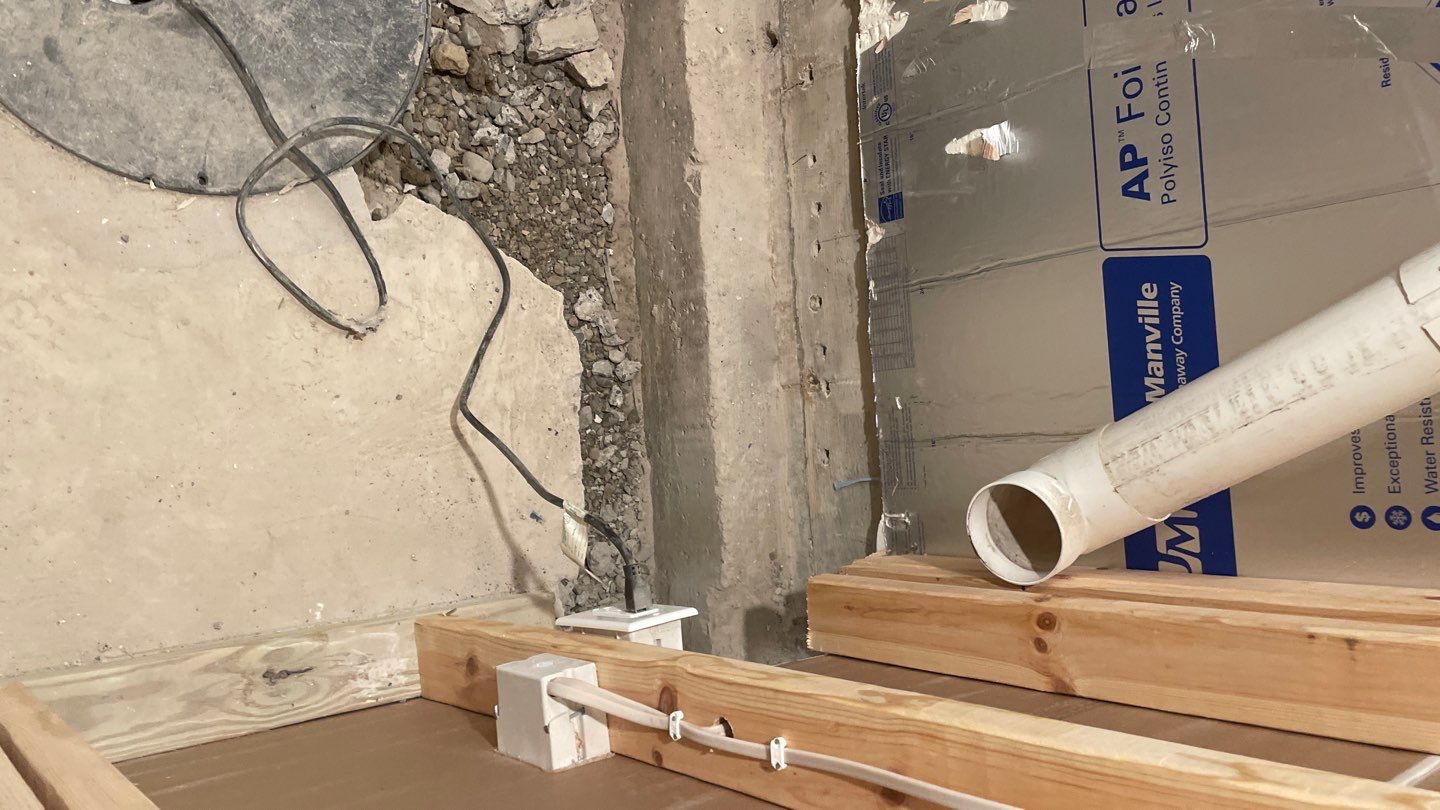 Interior Drain Tile & Buried Discharge in St. Anthony, MN by Waterproofing Northeast