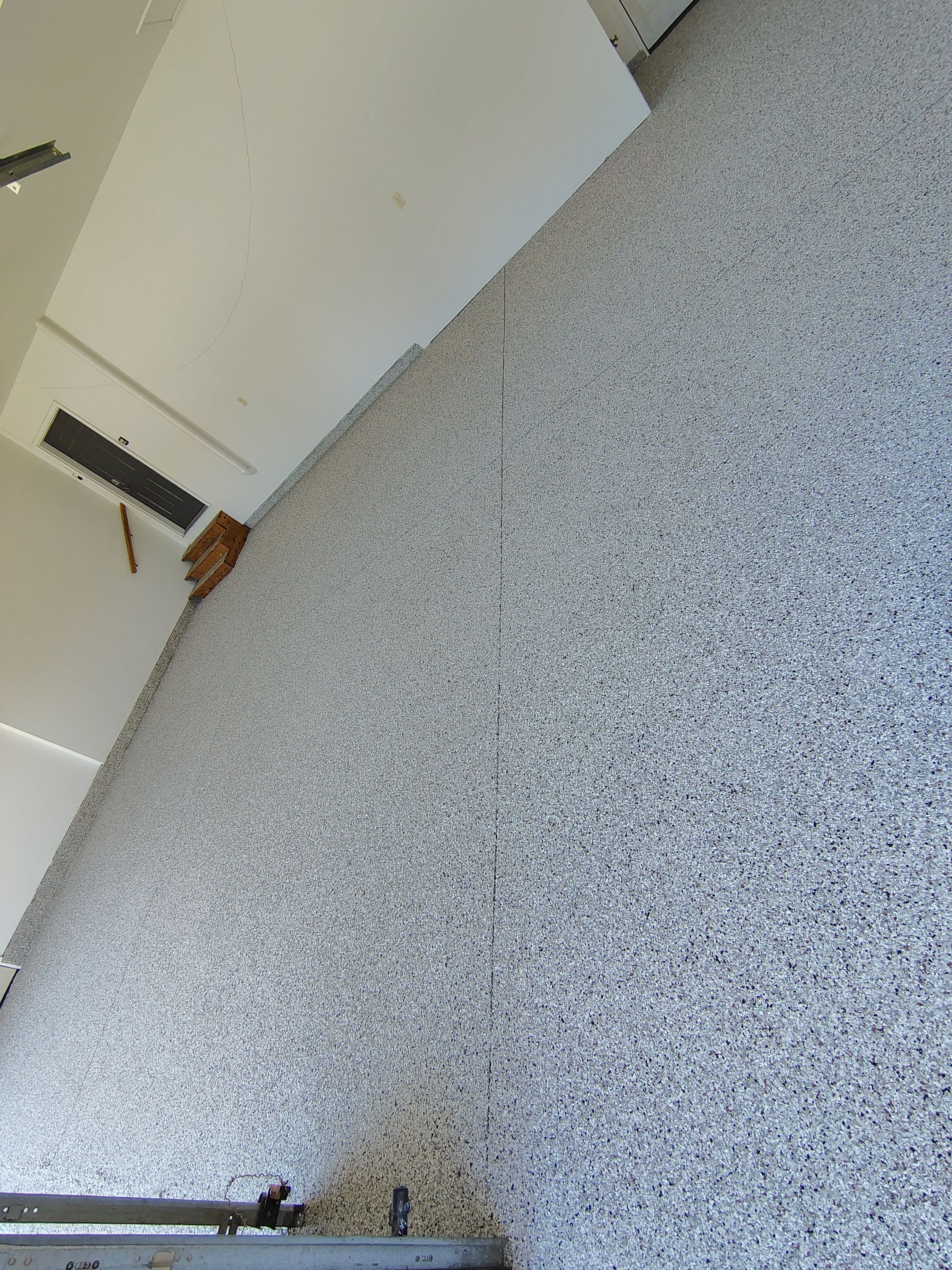 Custom Grey Speckled Epoxy Floor Coating for Sioux Falls Garage by Select Painting, Coatings & Garage Cabinets