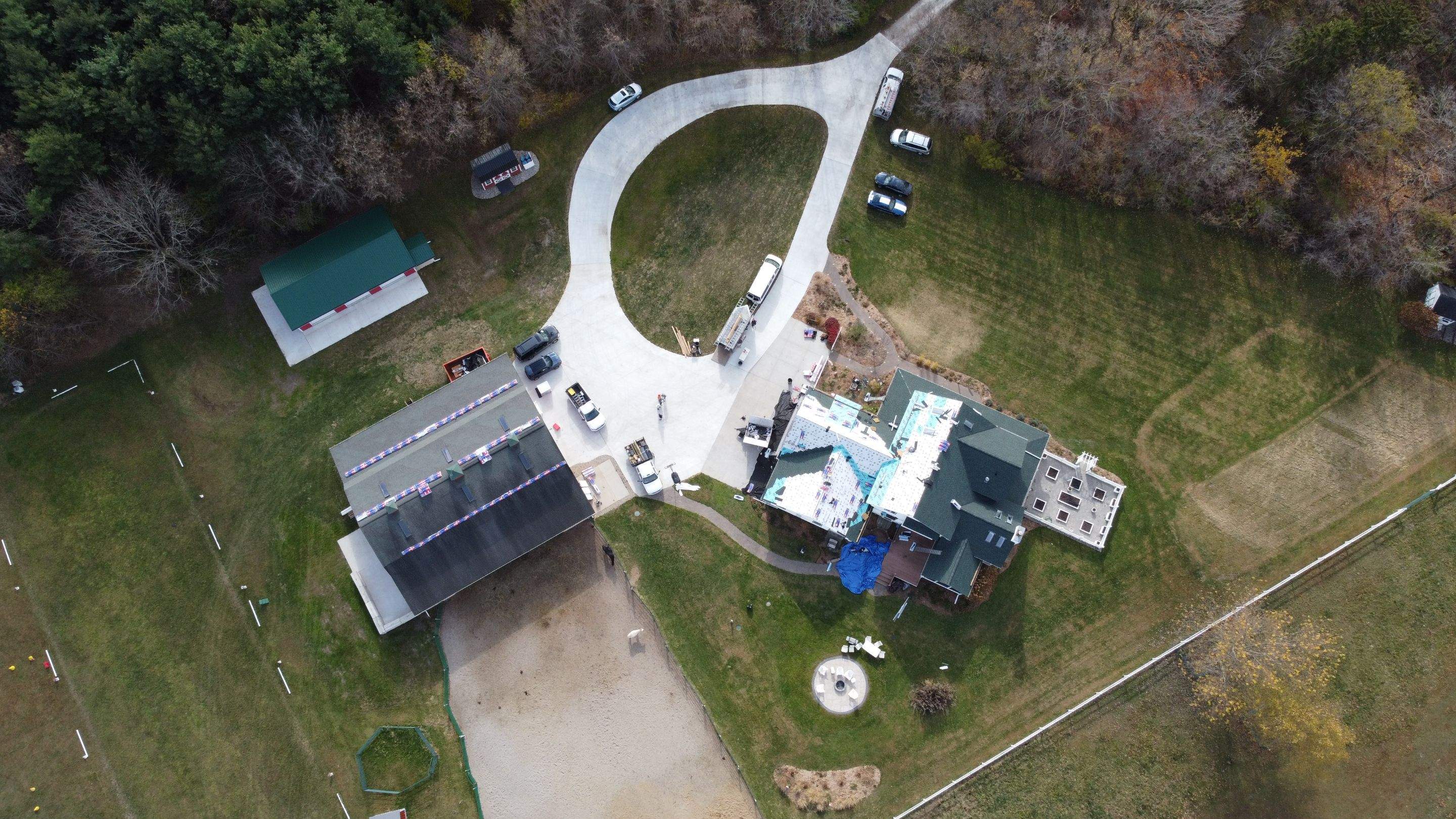 Residential Roofing Replacement with Multiple Skylights in Mason, Michigan by Acme Exteriors