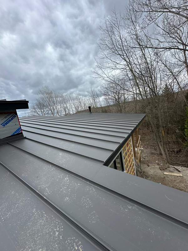 Residential Roofing Installation using 24 Ga Standing Seam Metal by Jay Carter Roofing & Sheet Metal