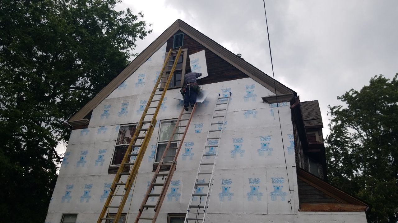 James Hardie Siding on Antique Home by Absolute Roofing and Construction