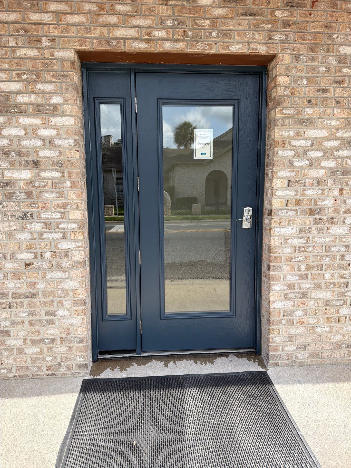 Commercial Entry Door Upgrade with ProVia Sidelight in Newberry by Windows & Doors Store