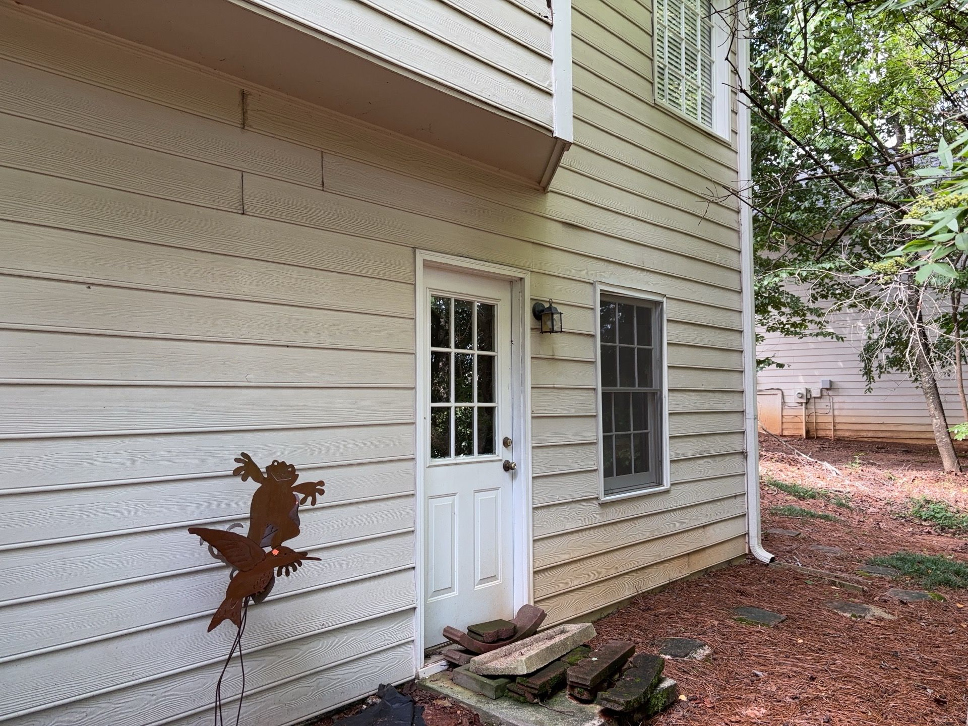 Blue Exterior Paint and Siding Installation using James Hardie Lap Siding by Nelson Exteriors