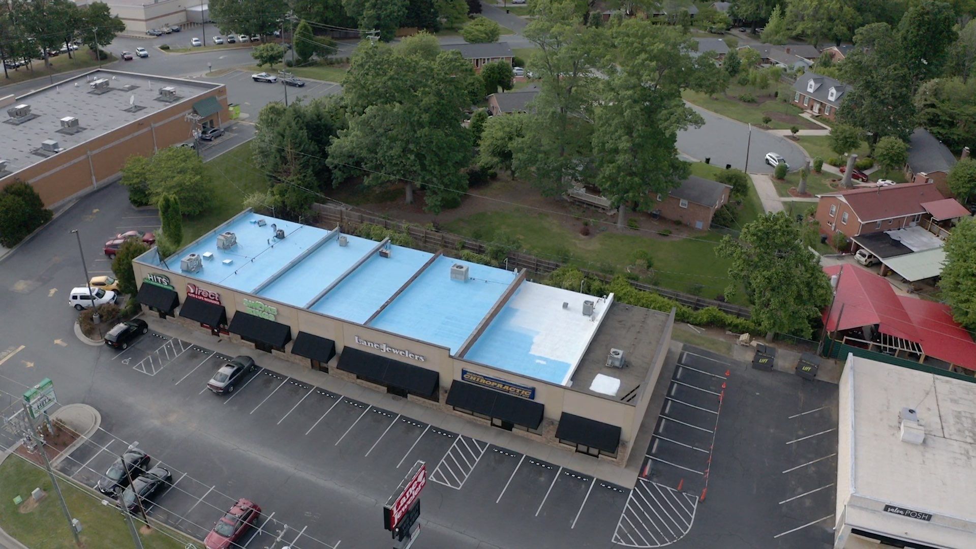 Commercial Roof Coating using Fiberseal basecoat and Silicon Topcoat by Just In Time Roofing and Restoration