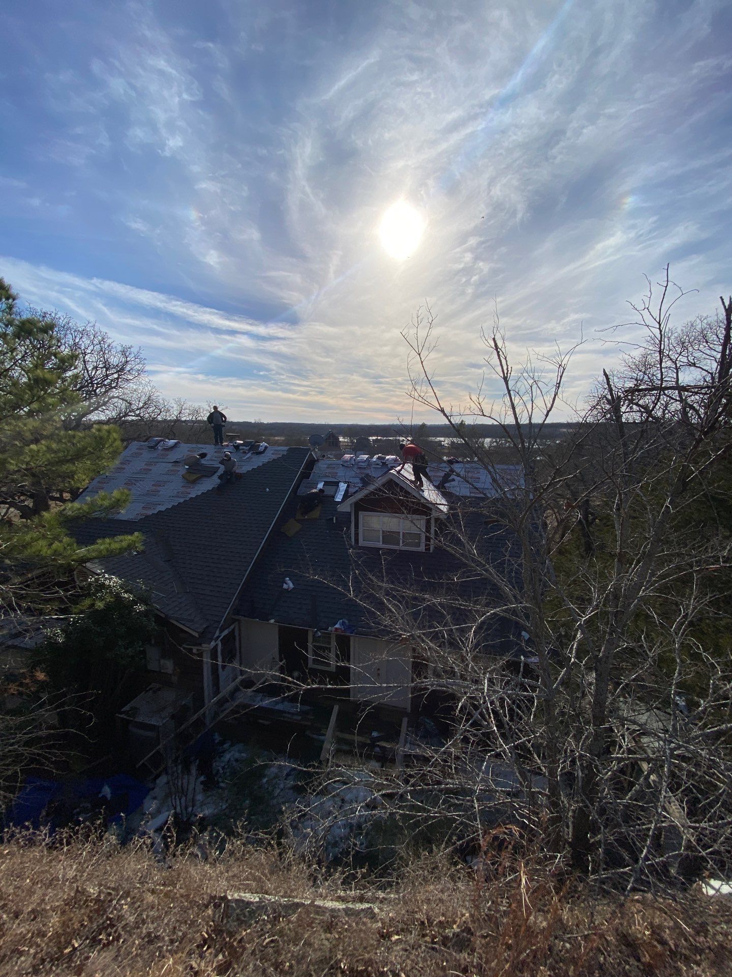 Roof Replacement on a private lake near Ardmore by BANA Roofing and Solar Supply