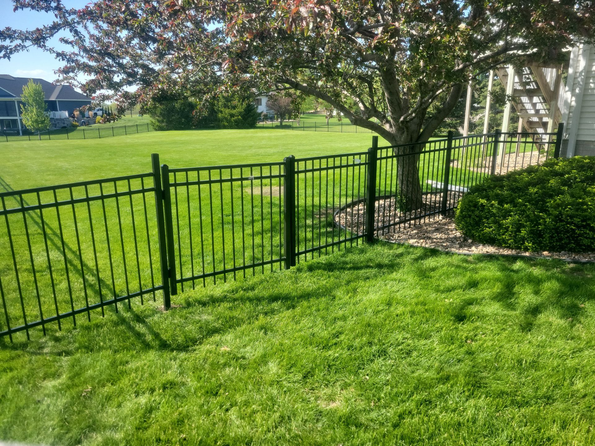 Black Ornamental Metal Picket Fence Installation in Waterloo by Perfect Picket Fence and Stain