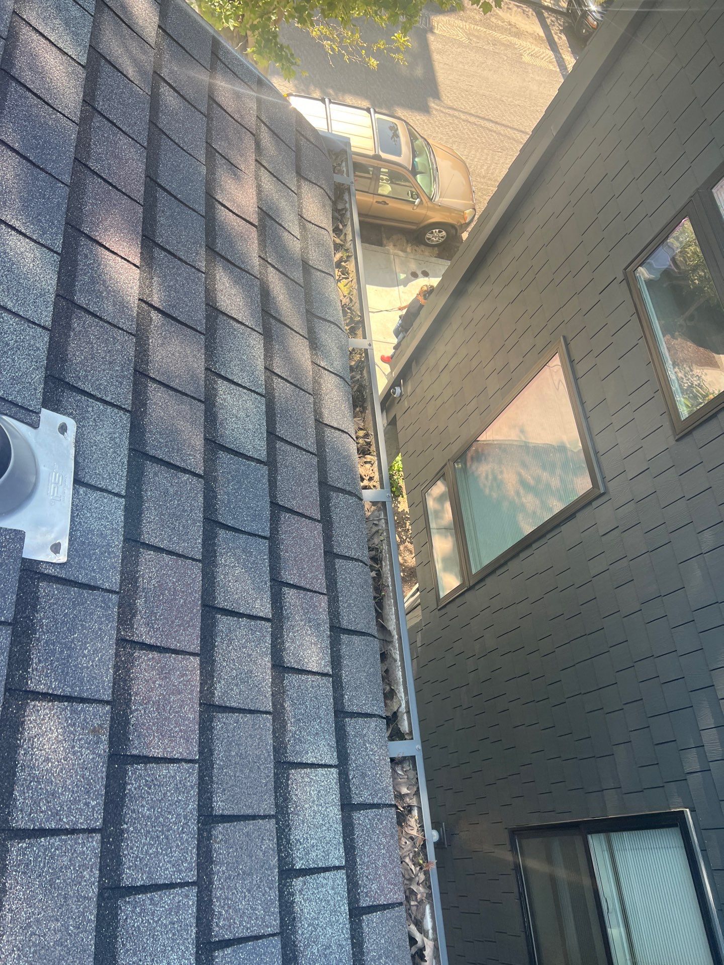 Commercial gutter cleaning Philadelphia before photo with filled gutters