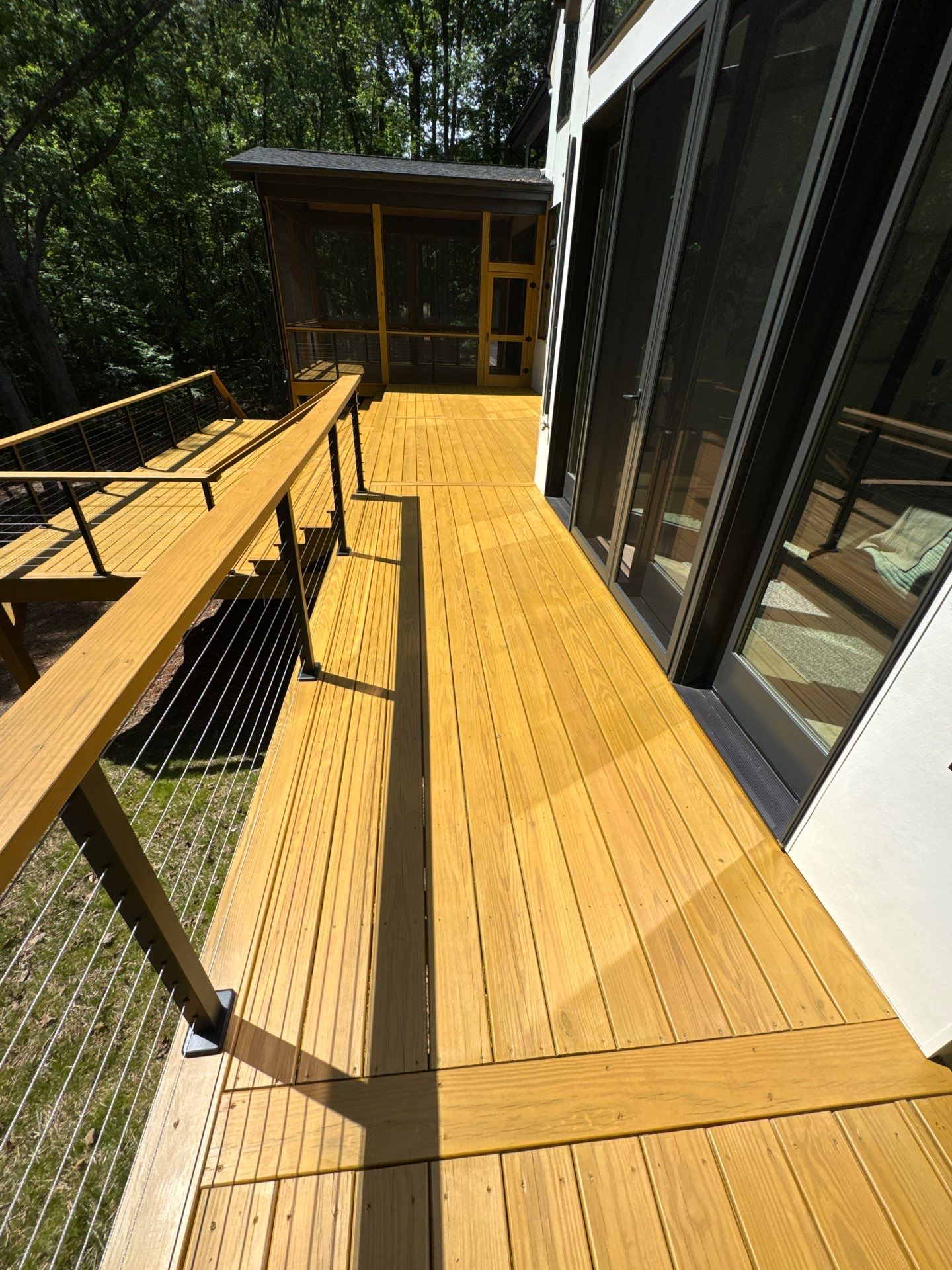 Porch and Deck staining  by GonzalezPainters & Contractors Inc 