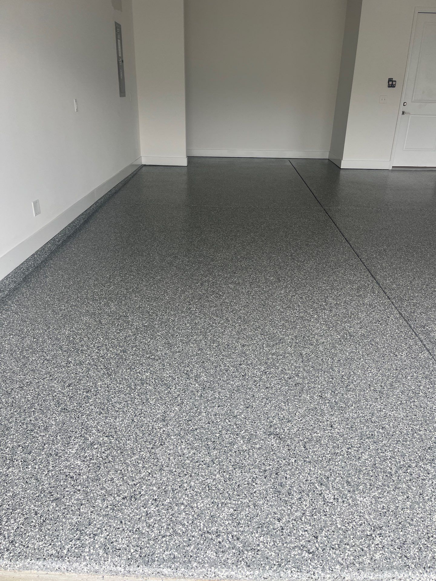 Garage Floor Coating using Wombat by My Garage Floor Guys