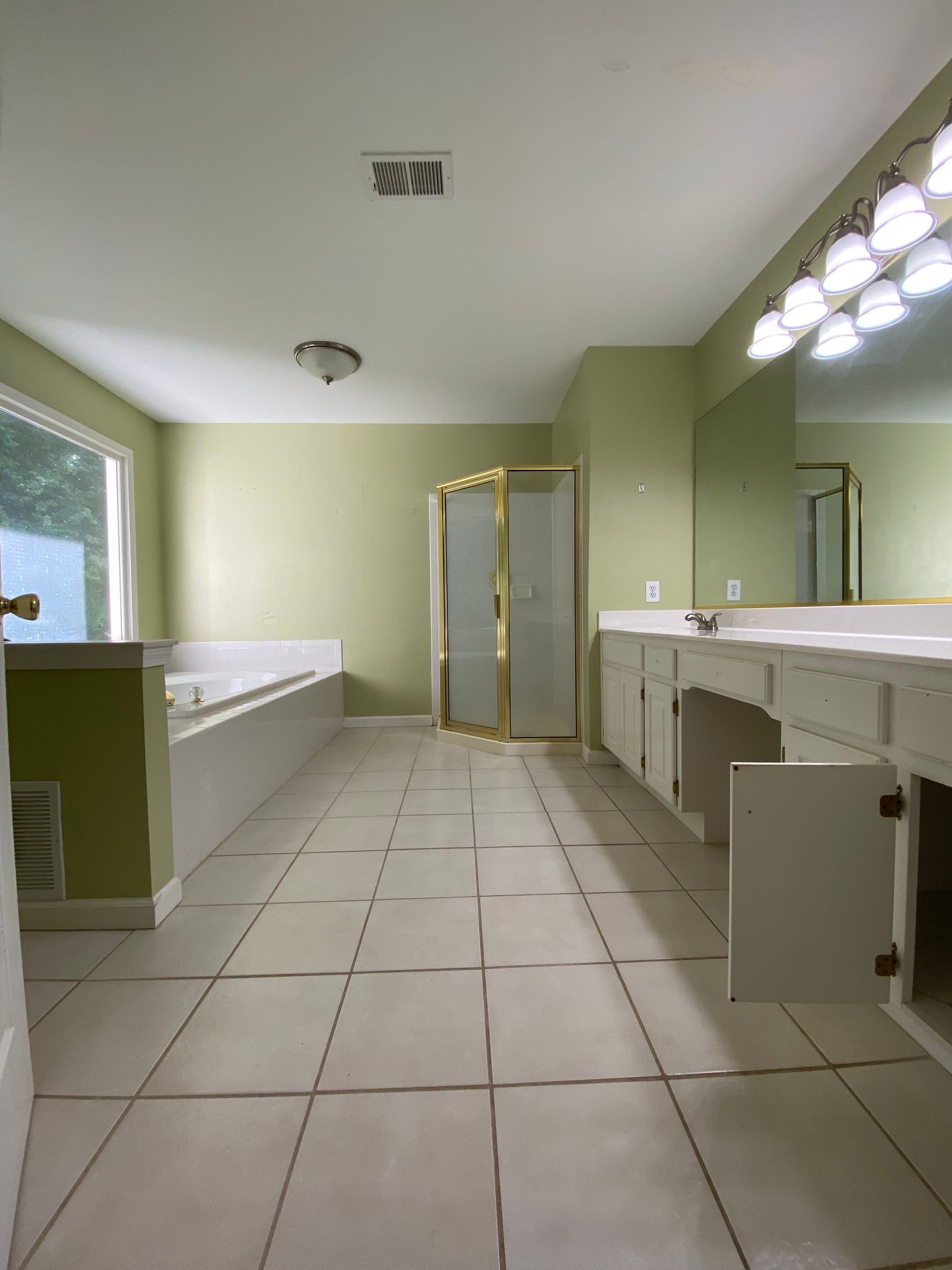 Master Bathroom Remodel with Freestanding Tub and Walk-In Shower in Kennesaw by Swift Home Renovations