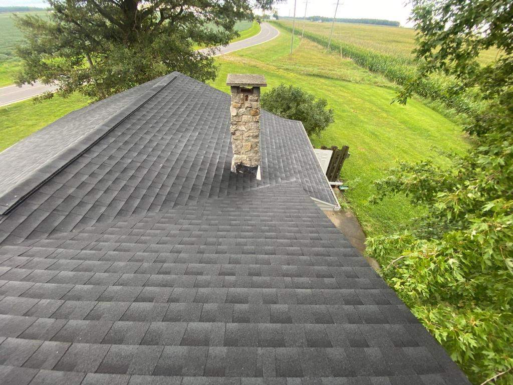 Storm damage roof replacement by Nitro Roofing and Construction