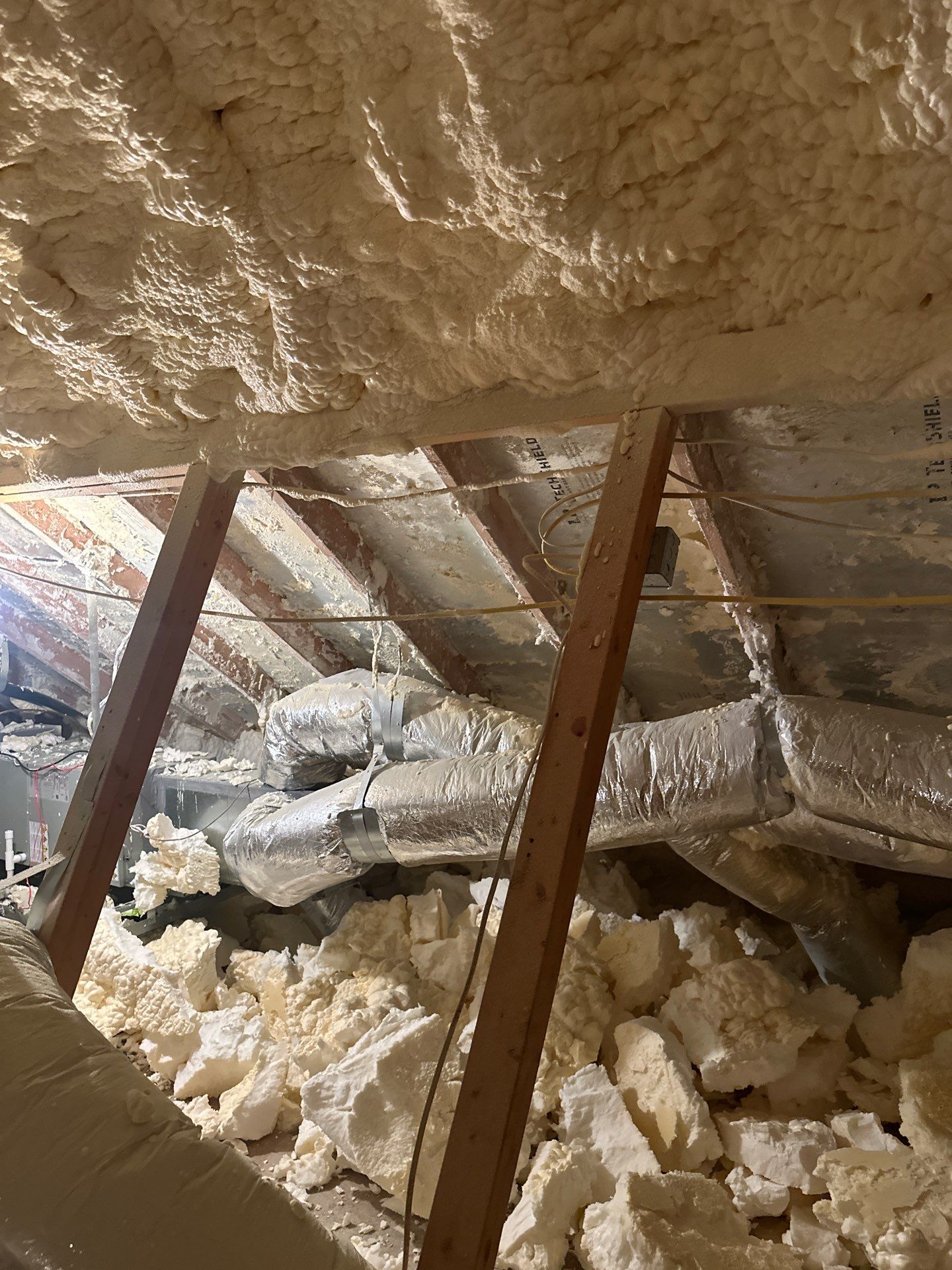 Spray foam insulation removal & re spray by Apex Insulation Solutions